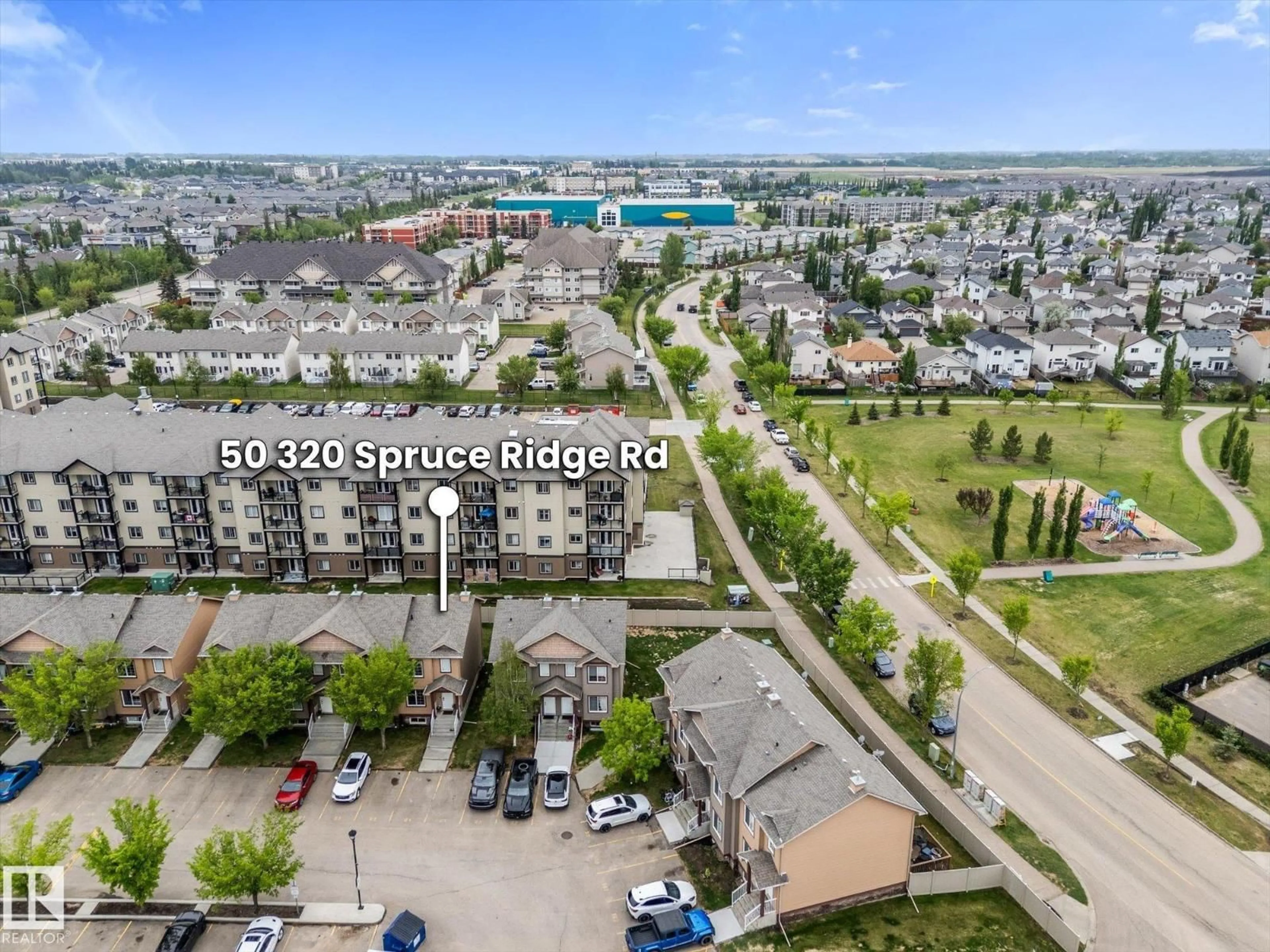 A pic from outside/outdoor area/front of a property/back of a property/a pic from drone, city buildings view from balcony for 50 320 SPRUCE RIDGE RD, Spruce Grove Alberta T7X2Z3
