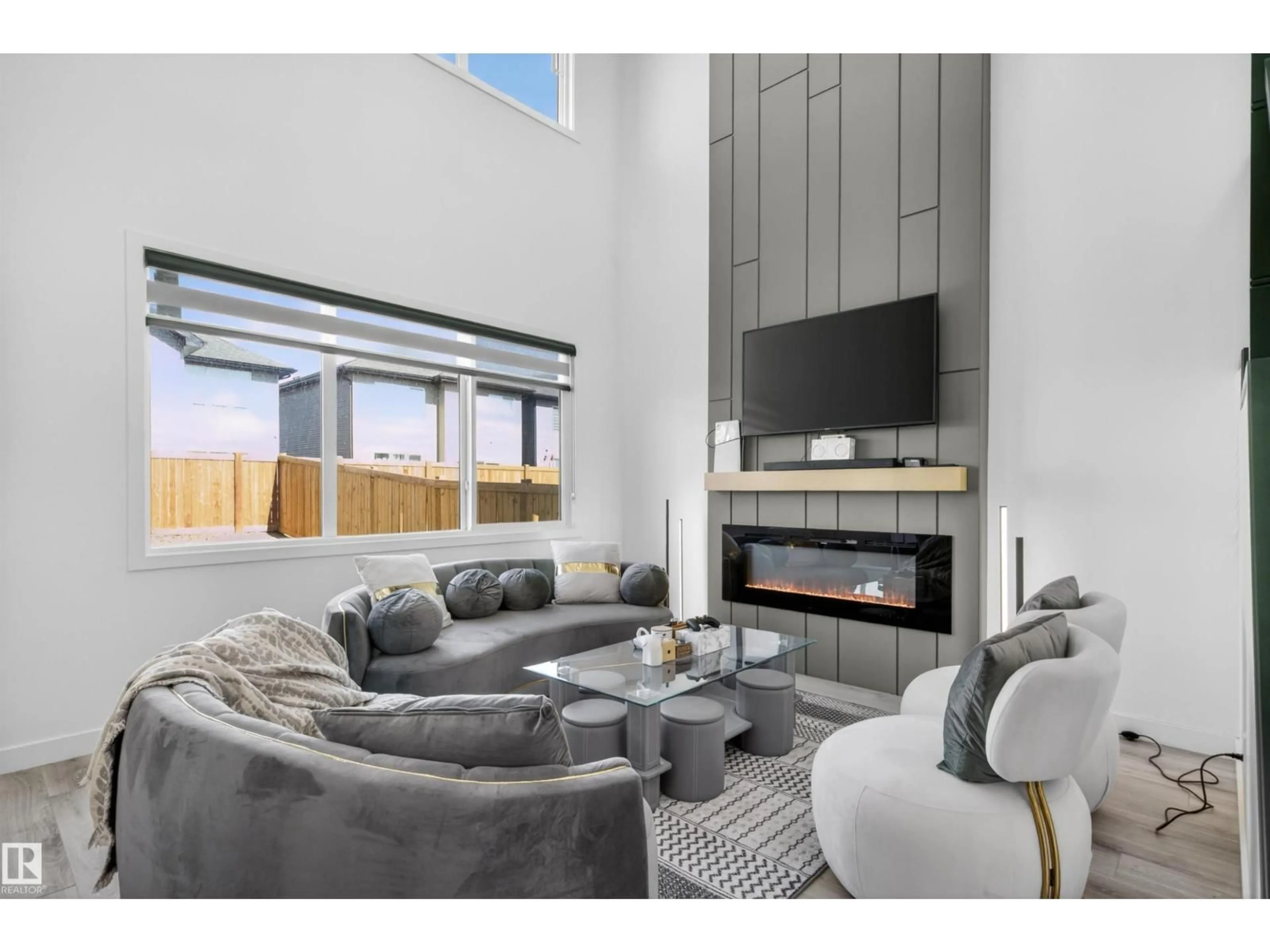 Living room with furniture, unknown for 1412 11 AV, Edmonton Alberta T6T2W4