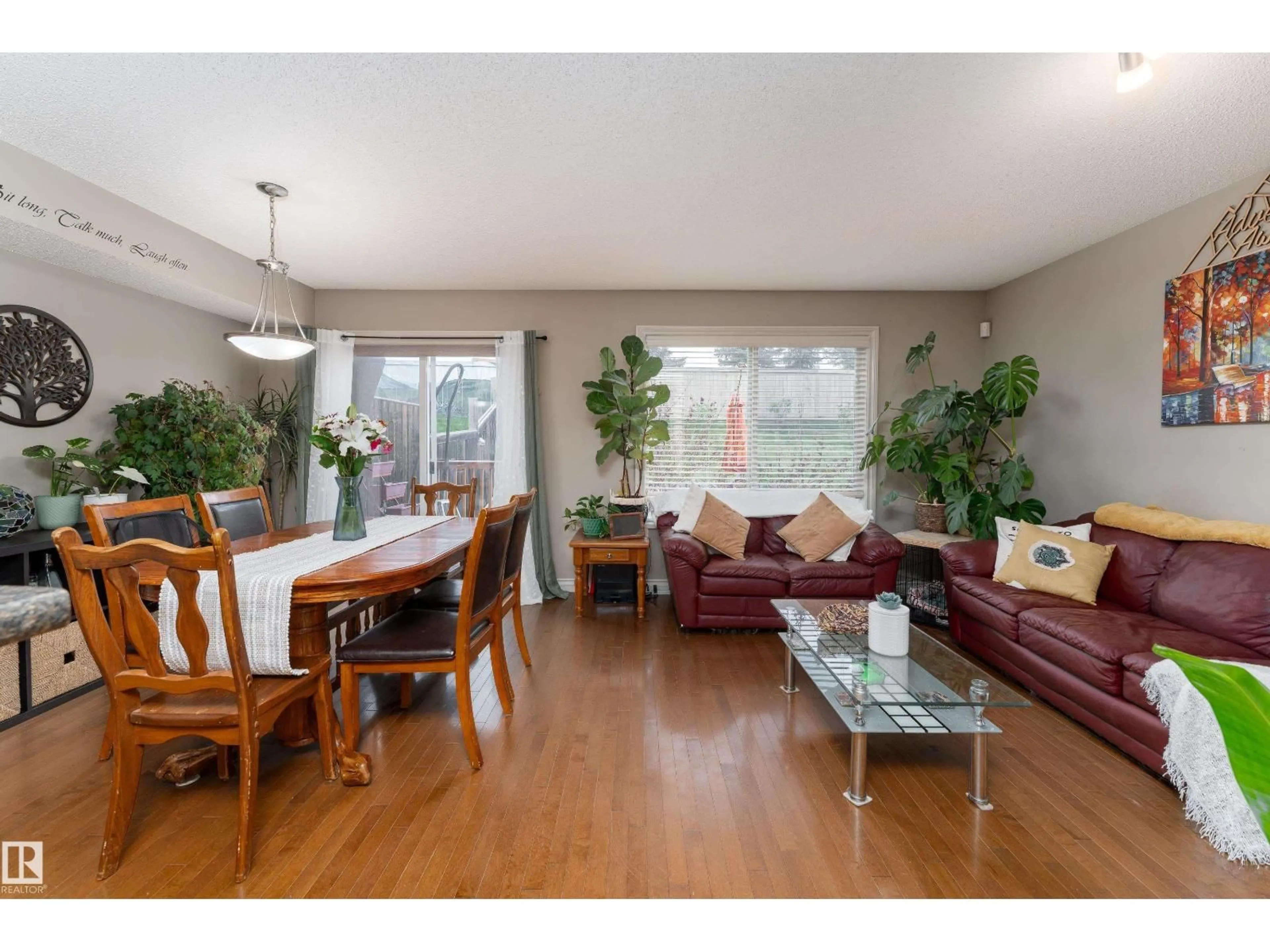 Living room with furniture, wood/laminate floor for 49 HARTWICK LO, Spruce Grove Alberta T7X0A5