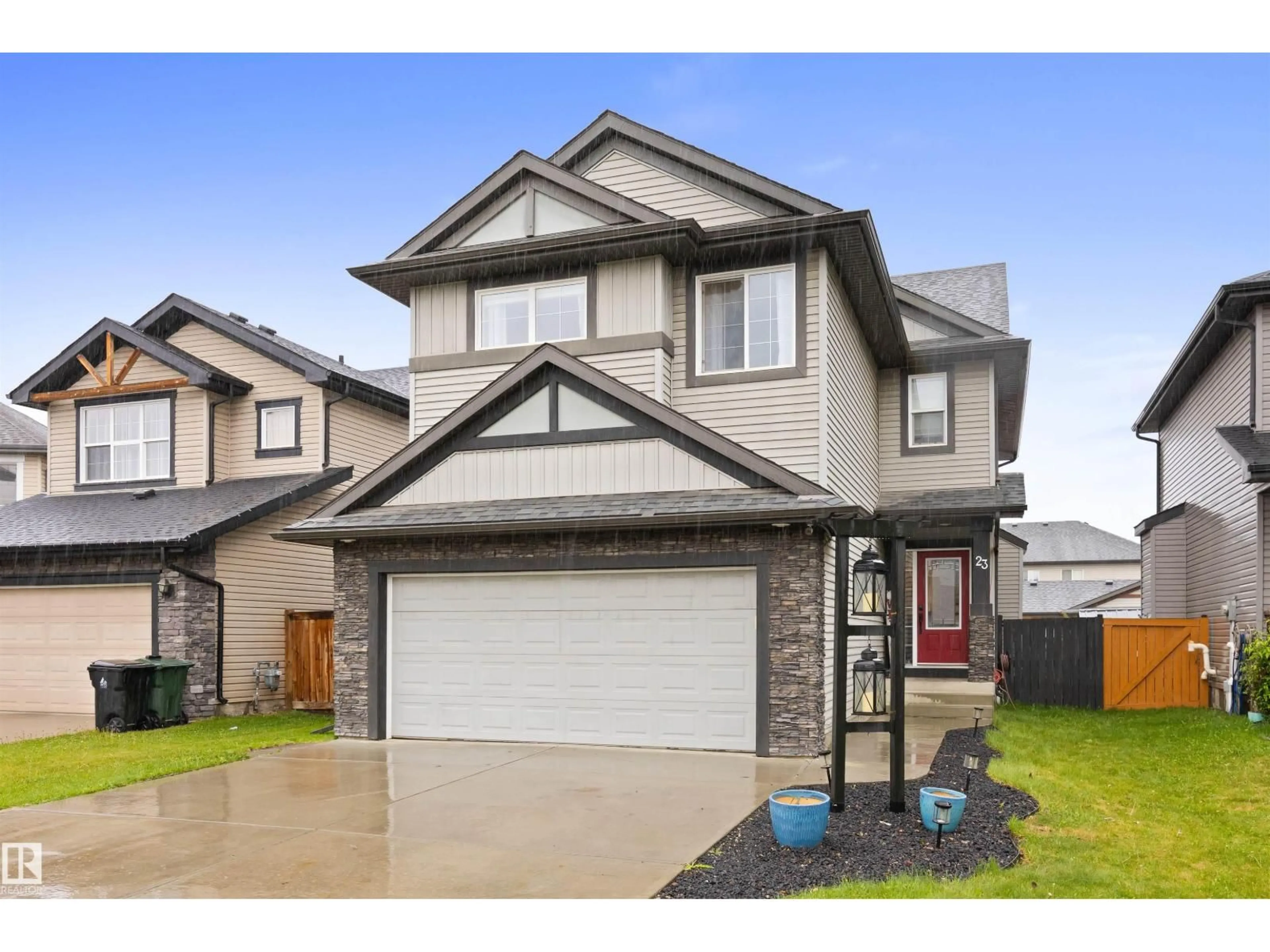 Home with vinyl exterior material, street for 23 MEADOWVIEW LD, Spruce Grove Alberta T7X0N8