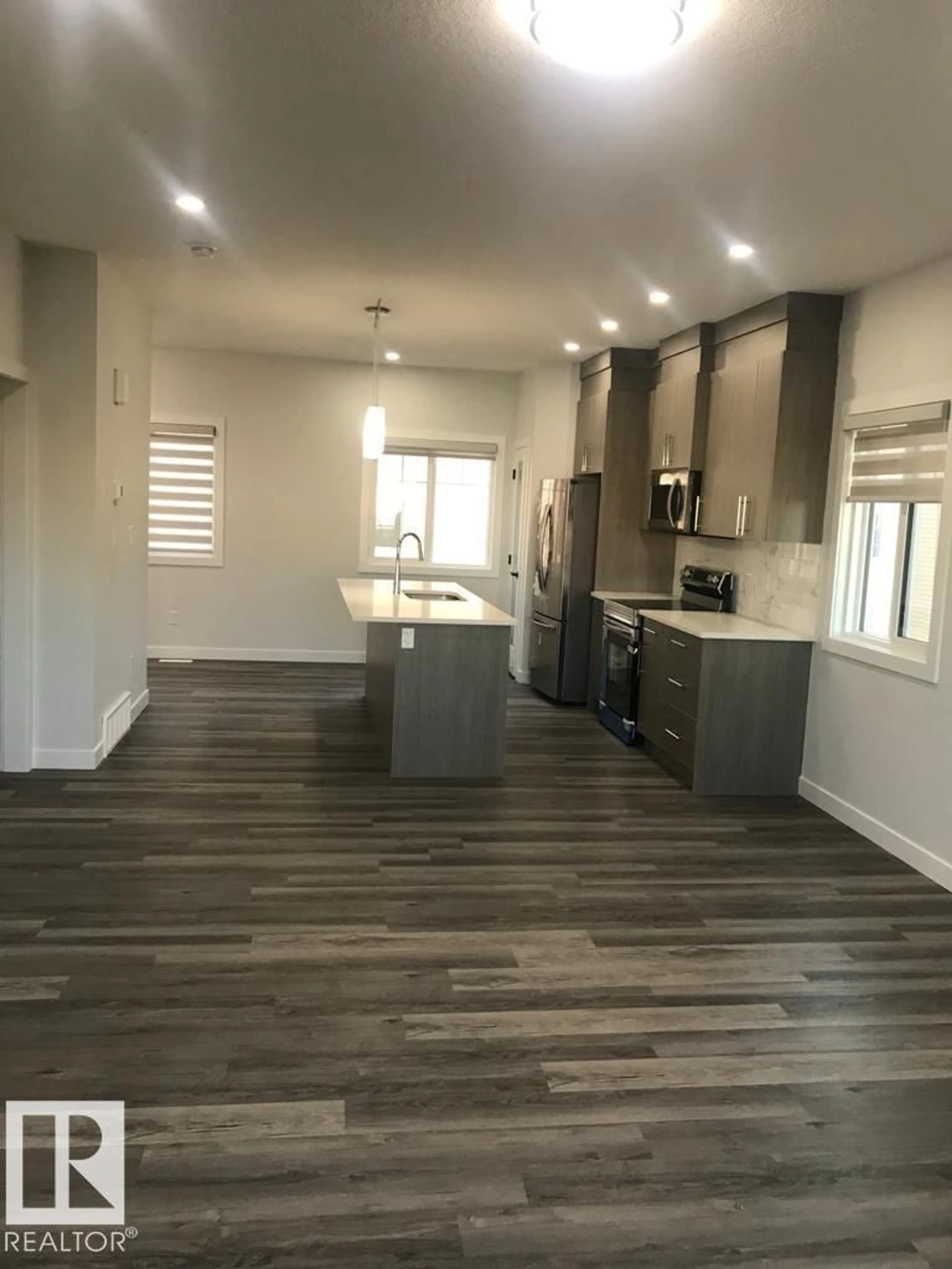 Open concept kitchen, unknown for #10 - 2803 14 AV, Edmonton Alberta T6T2K4