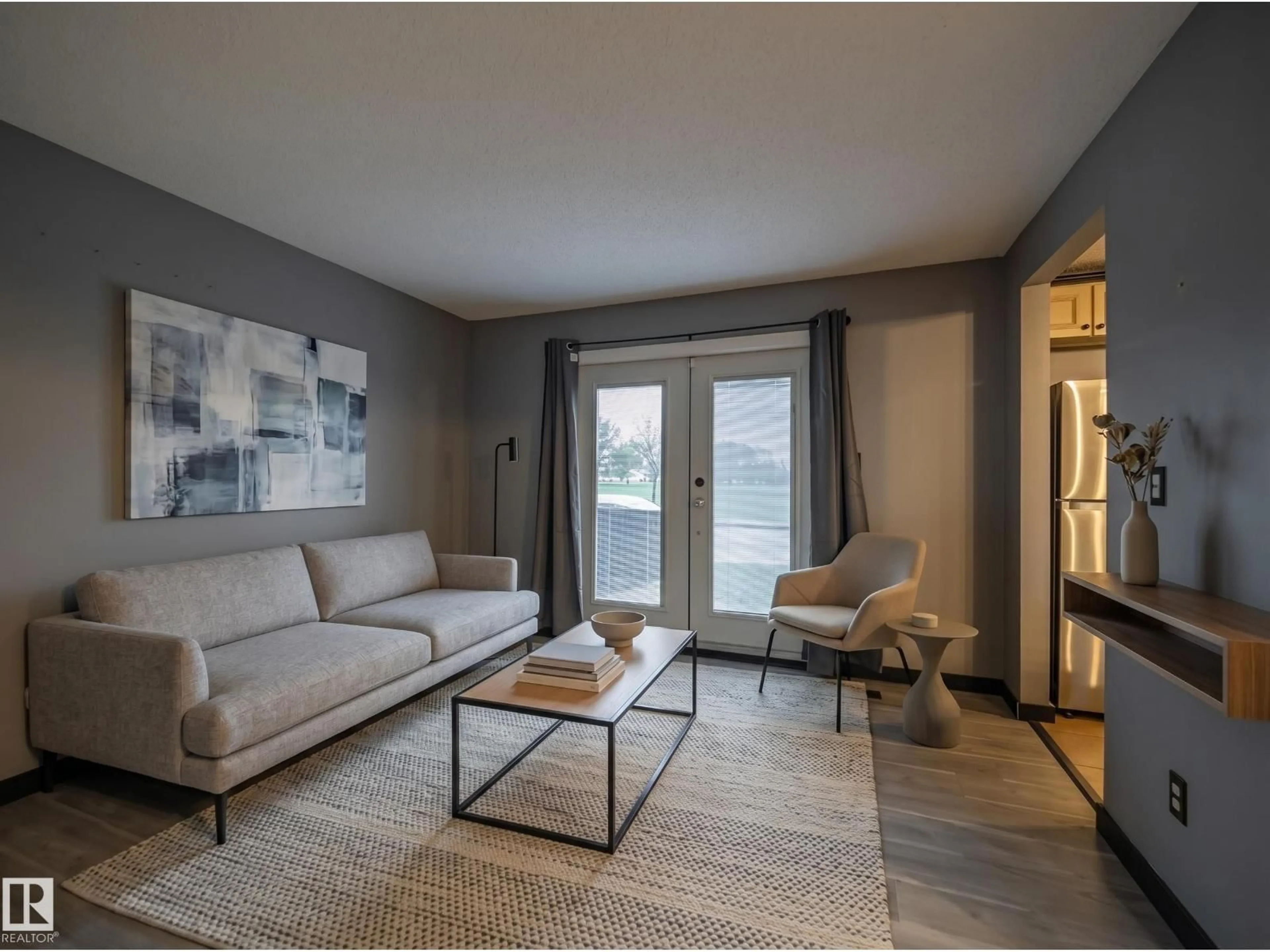 Living room with furniture, unknown for NW - 14207 117 ST, Edmonton Alberta T5X1N2