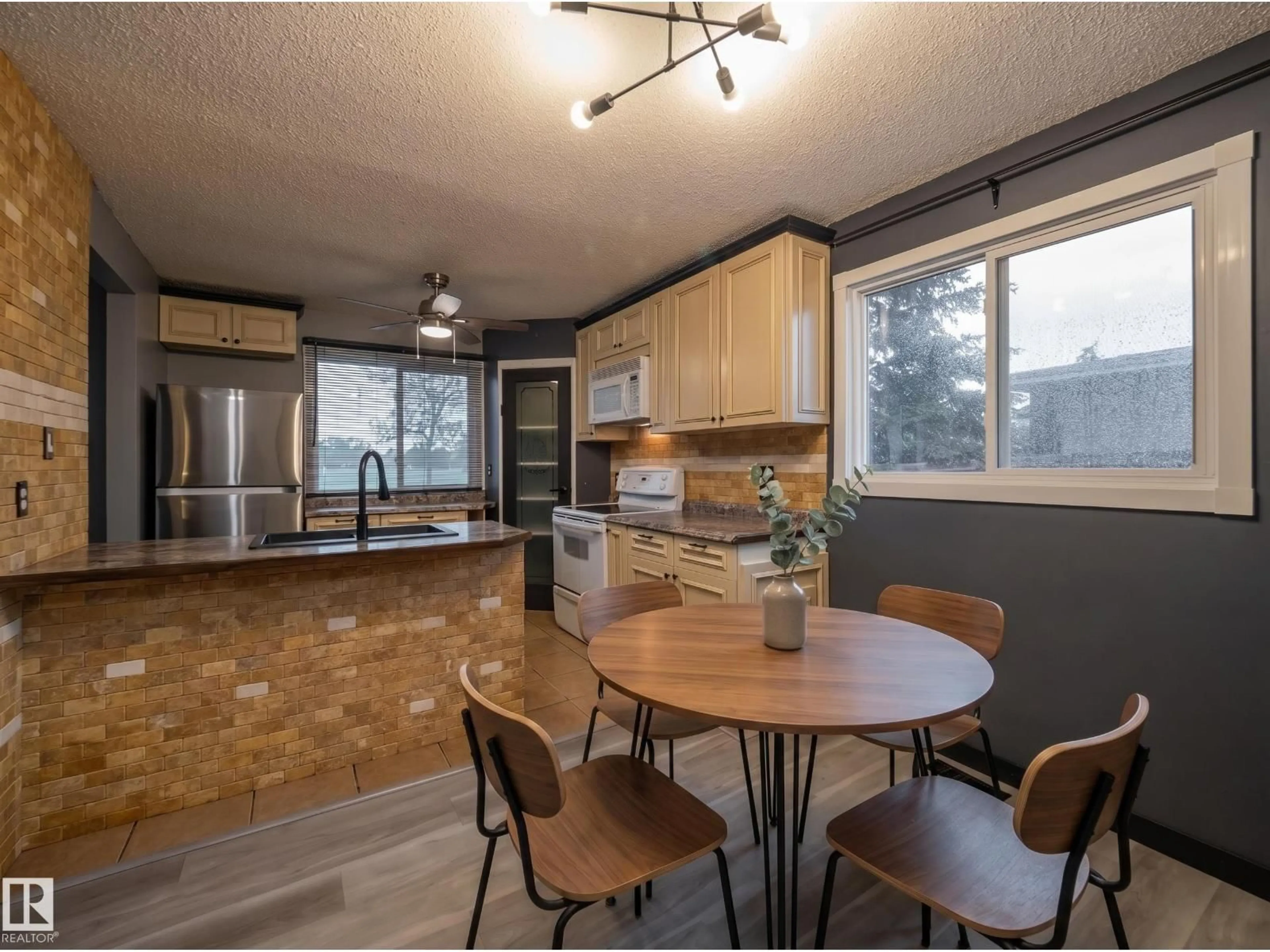 Open concept kitchen, unknown for NW - 14207 117 ST, Edmonton Alberta T5X1N2