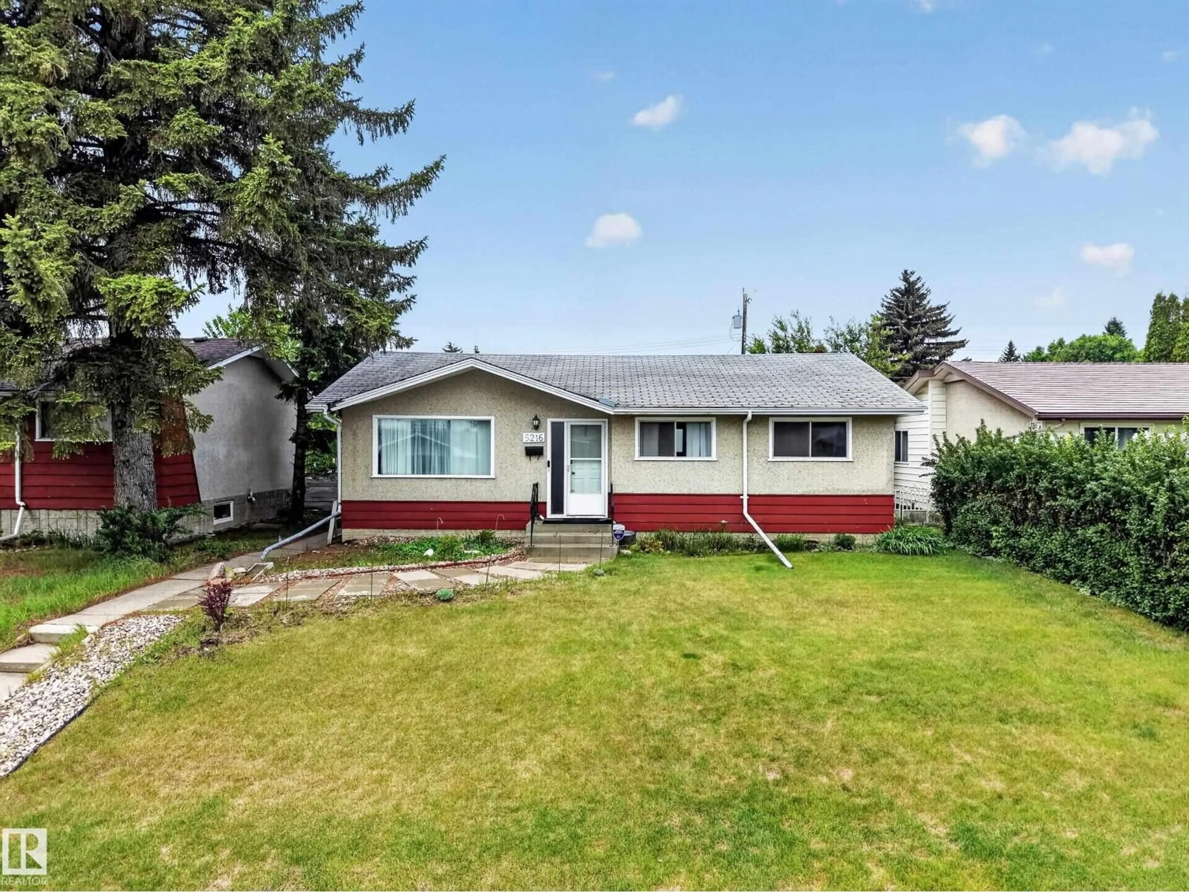 Home with vinyl exterior material, street for NW - 5216 104A ST, Edmonton Alberta T6H2M1