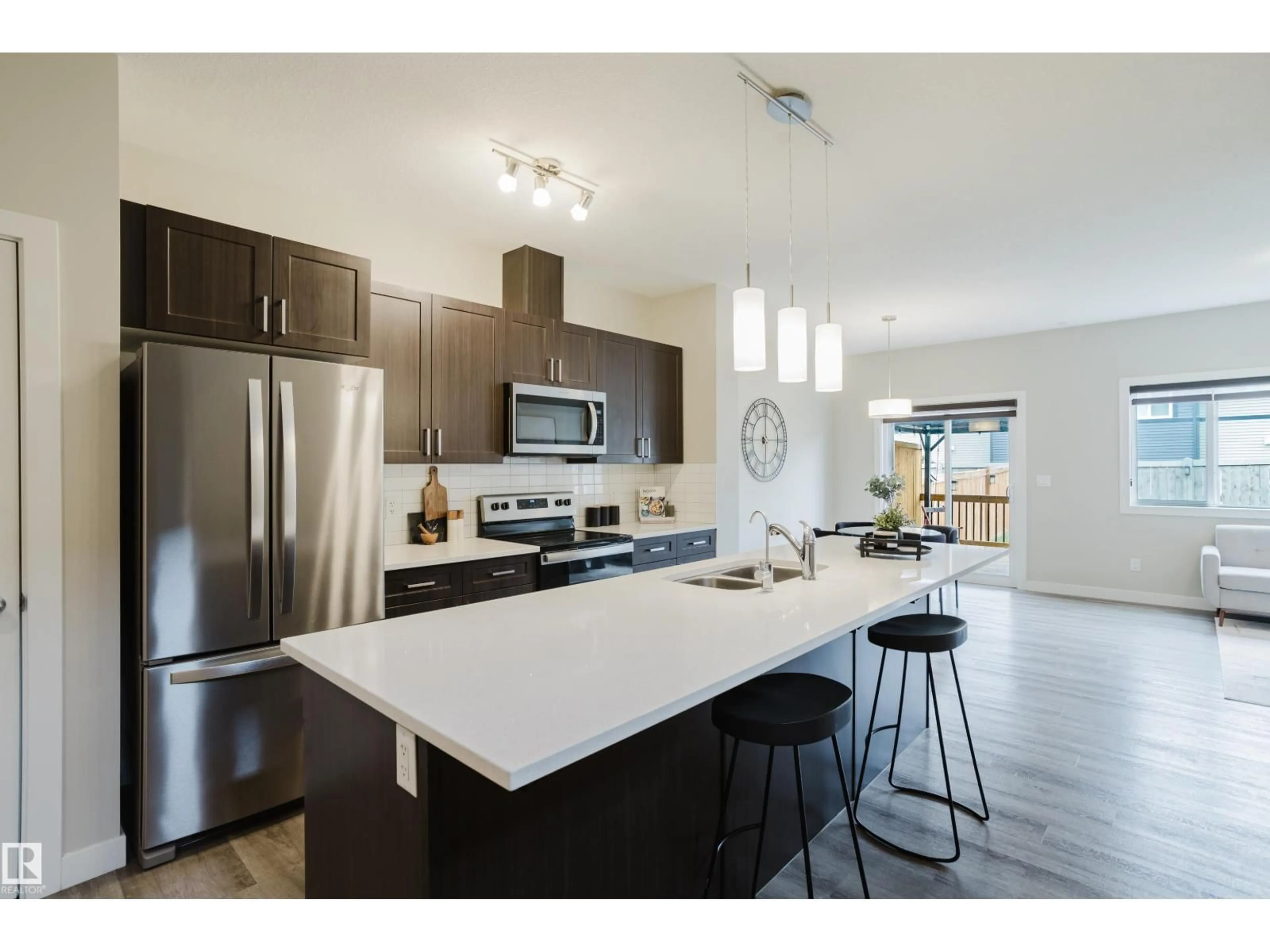 Open concept kitchen, ceramic/tile floor for 9142 PEAR DR, Edmonton Alberta T6X2N8