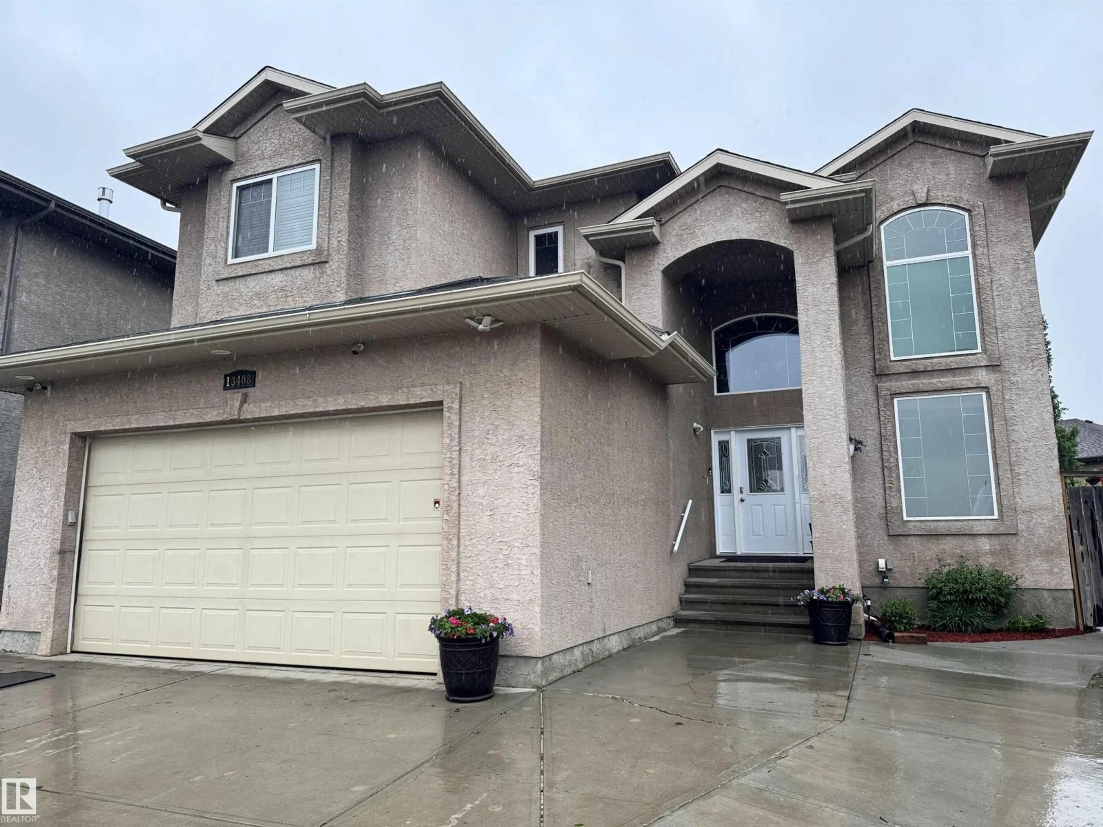 Home with vinyl exterior material, street for 13408 162 NW, Edmonton Alberta T6V0C1