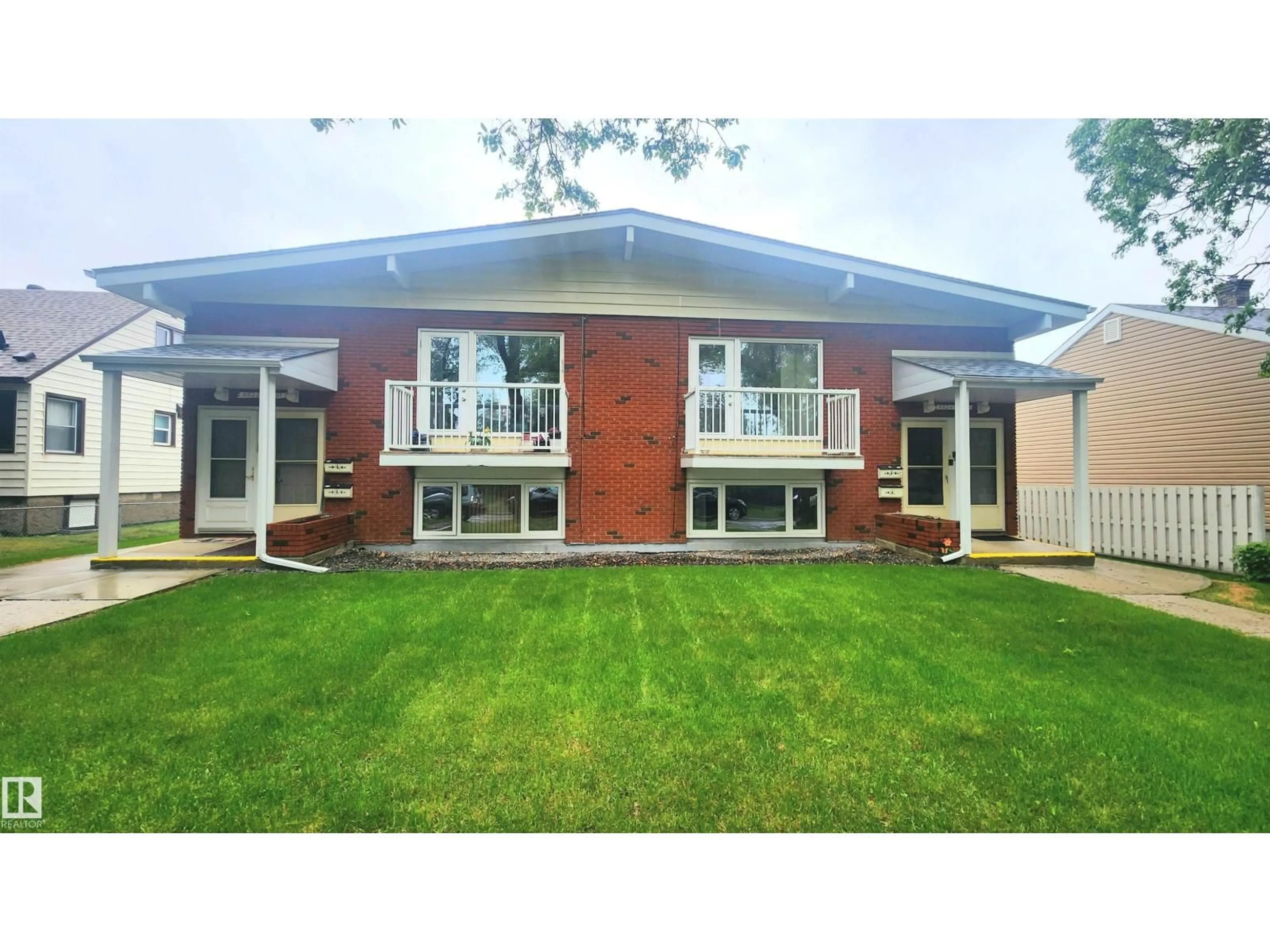 Home with brick exterior material, street for 8824 90 ST, Edmonton Alberta T6C0M1