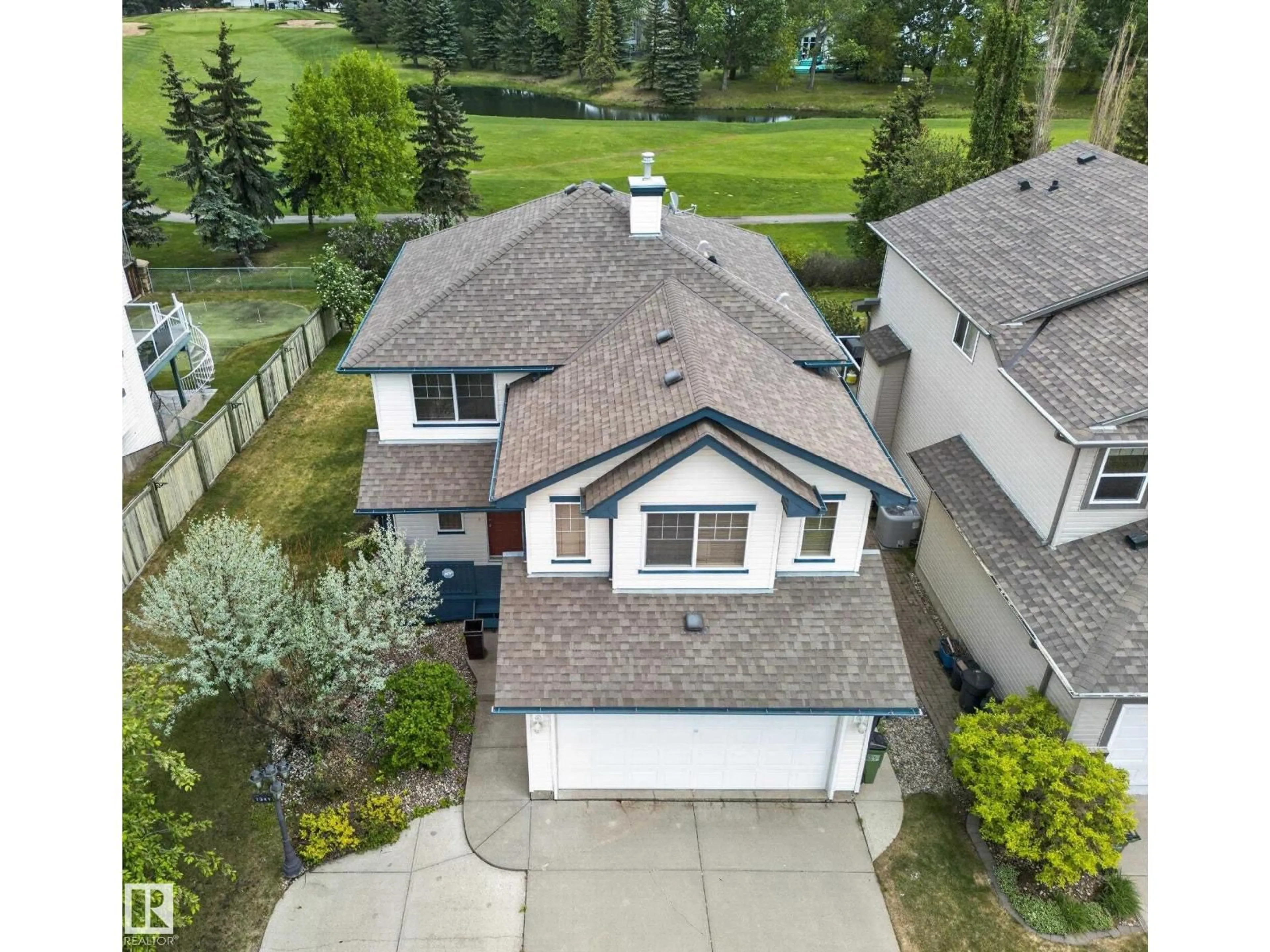 A pic from outside/outdoor area/front of a property/back of a property/a pic from drone, street for 1381 BRECKENRIDGE DR, Edmonton Alberta T8T6M2