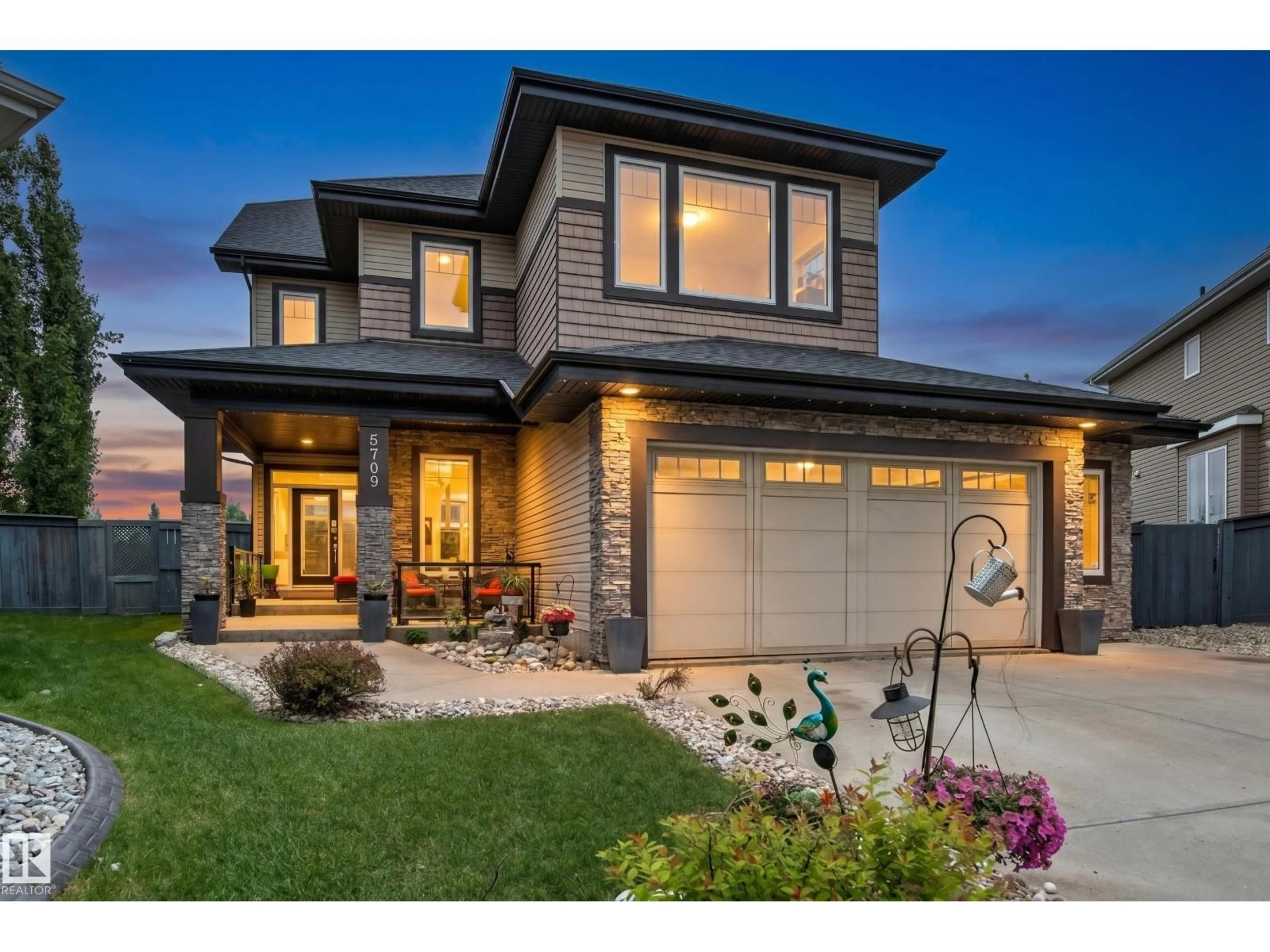 Home with brick exterior material, street for 5709 MCLUHAN BA, Edmonton Alberta T6R0P8