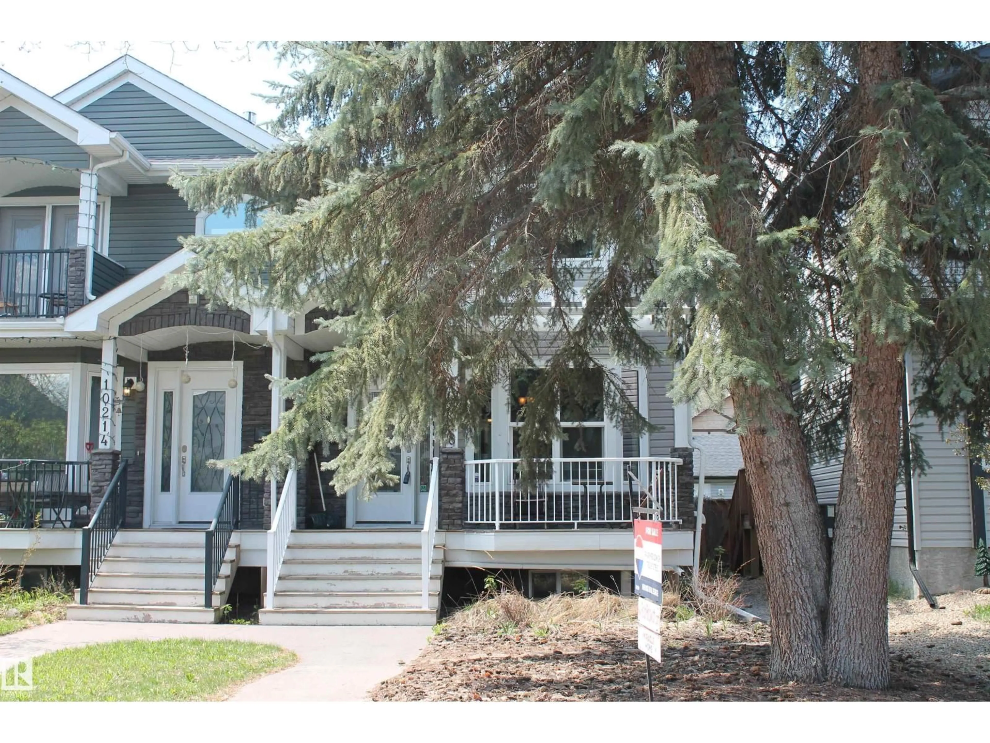 Home with vinyl exterior material, street for NW - 10216 89 ST, Edmonton Alberta T5H1R1