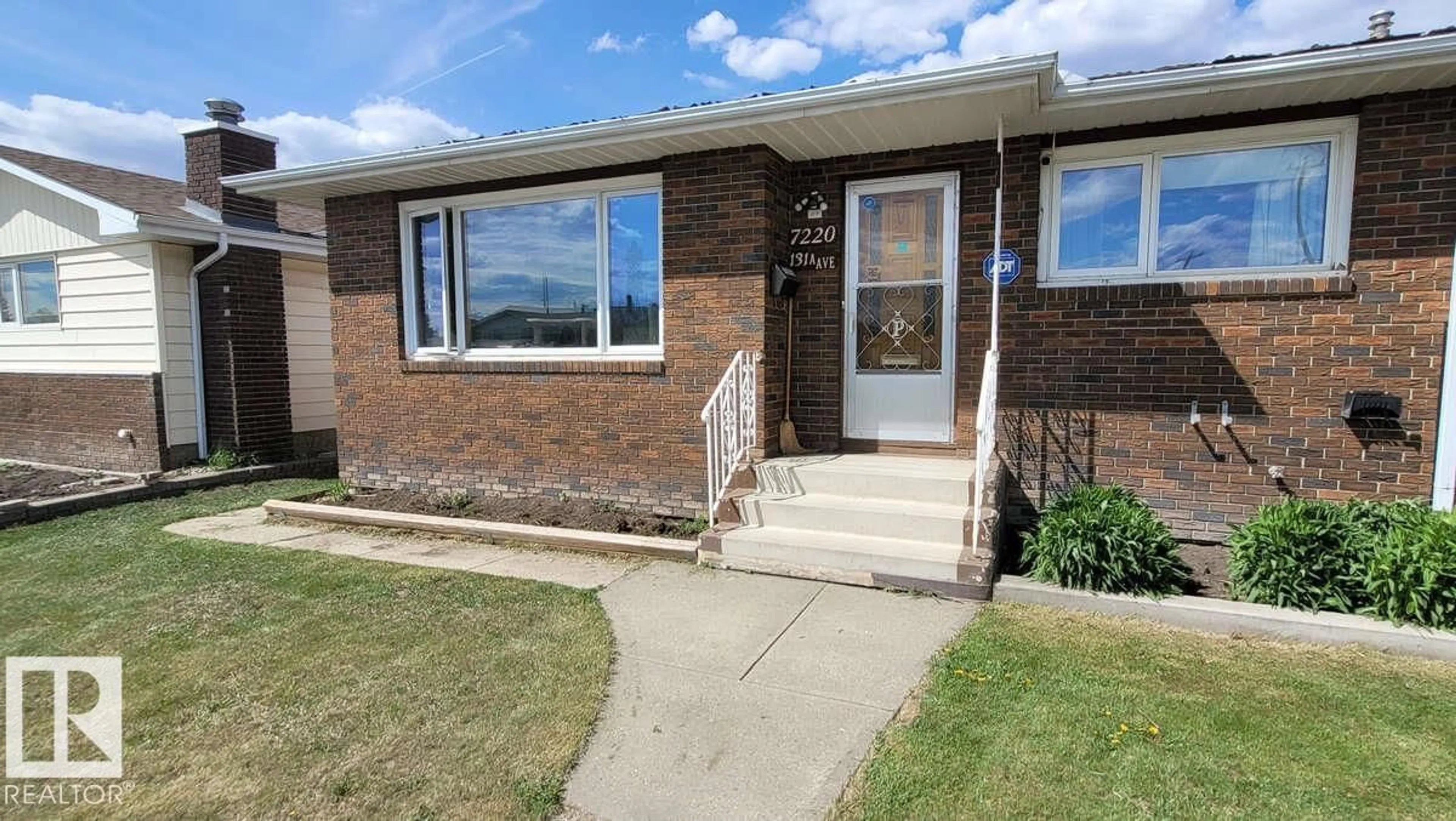 Home with brick exterior material, street for 7220 131A AV, Edmonton Alberta T5C1Z8