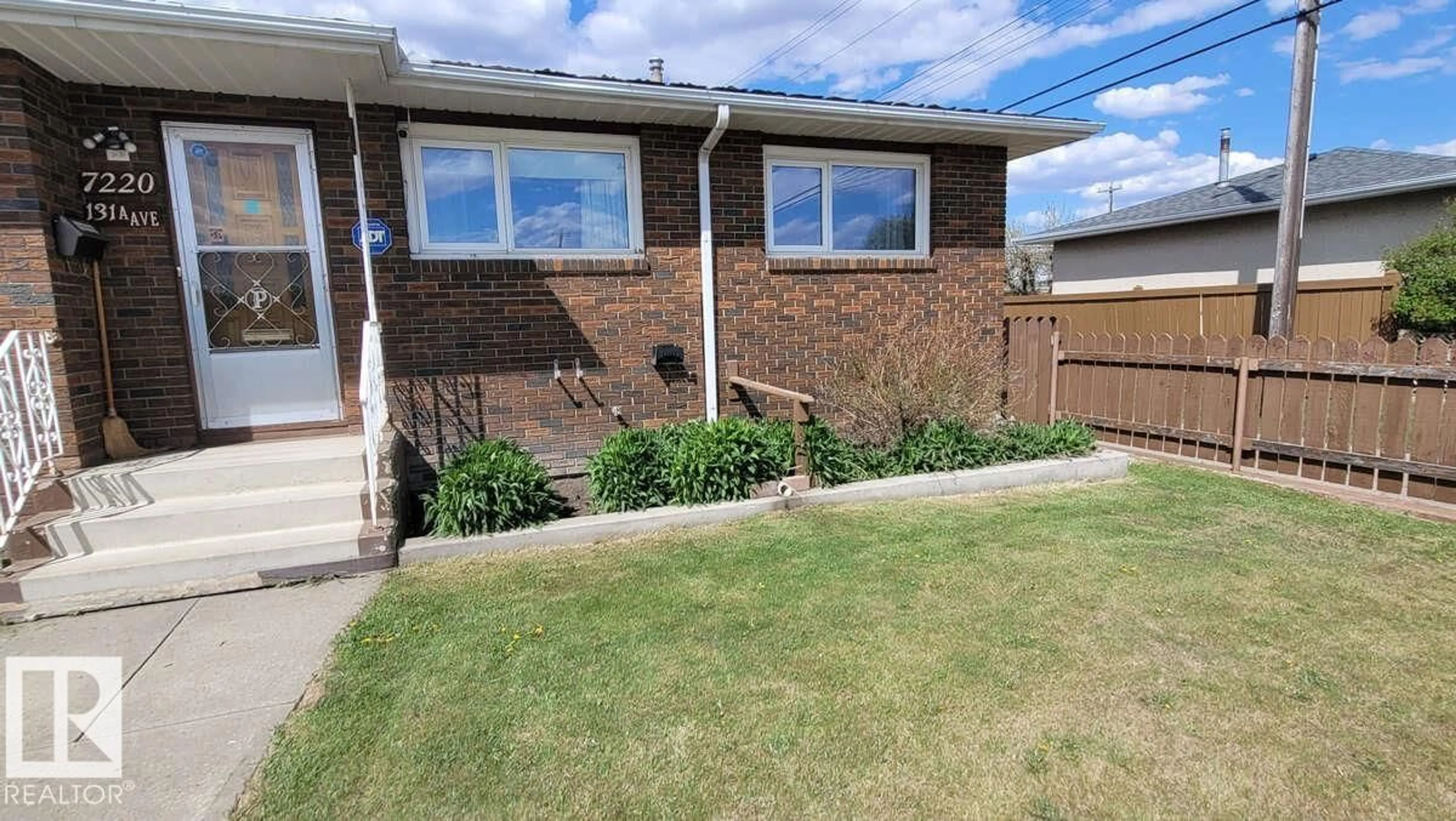 Home with brick exterior material, street for 7220 131A AV, Edmonton Alberta T5C1Z8