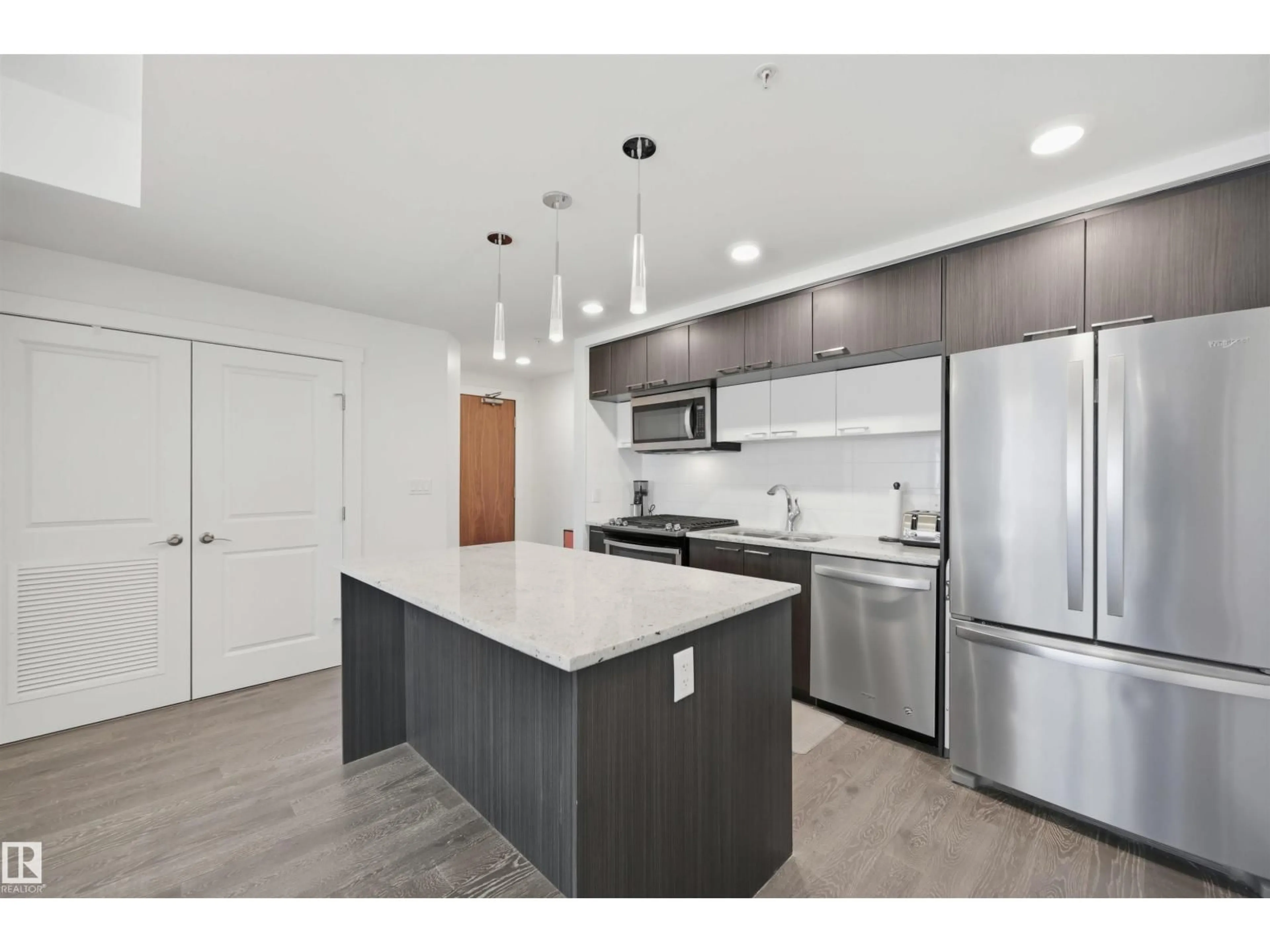 Open concept kitchen, unknown for 2002 106 ST NW, Edmonton Alberta T5K0K8