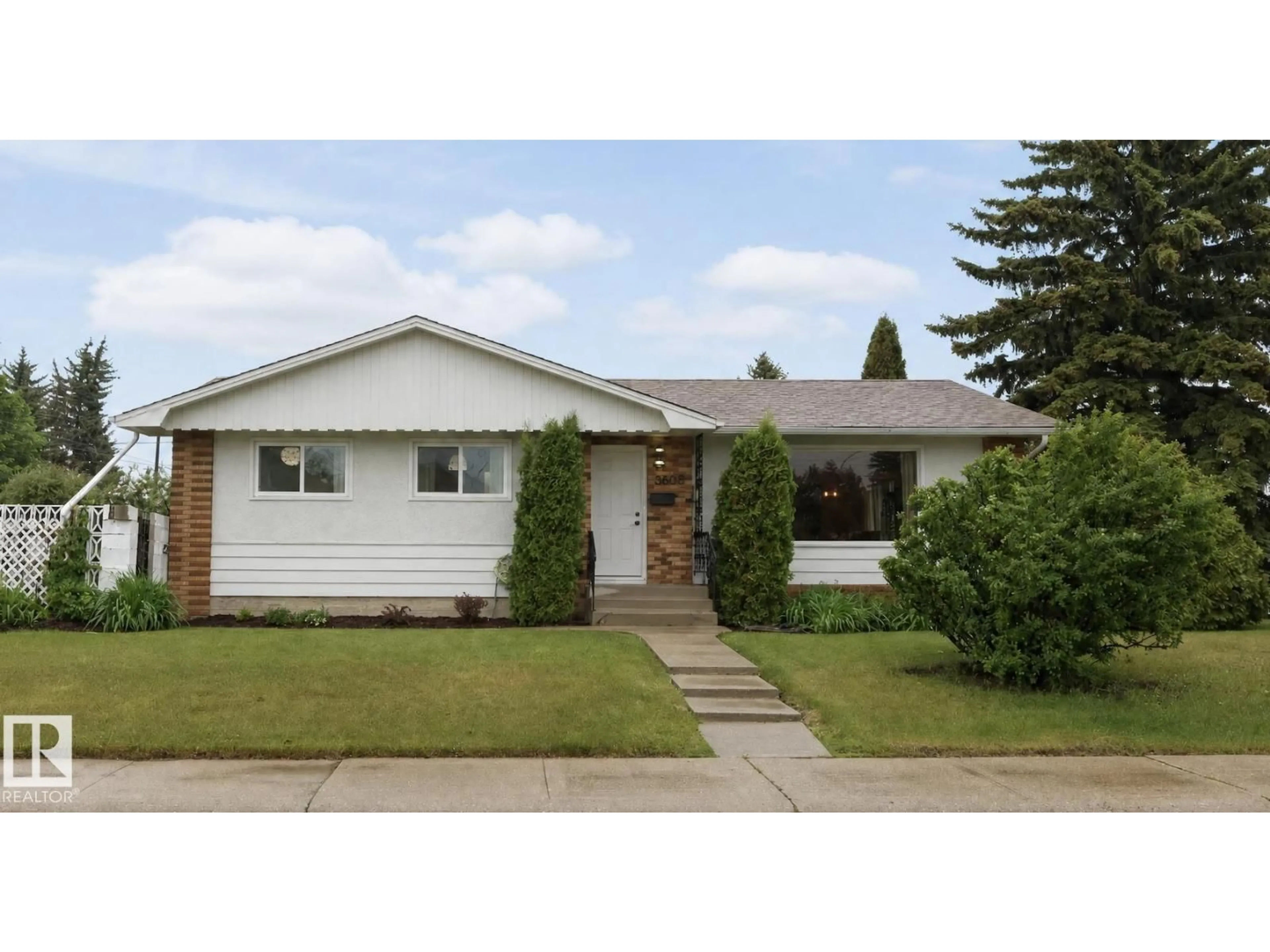Home with vinyl exterior material, street for 8603 73 ST, Edmonton Alberta T6B1Z9