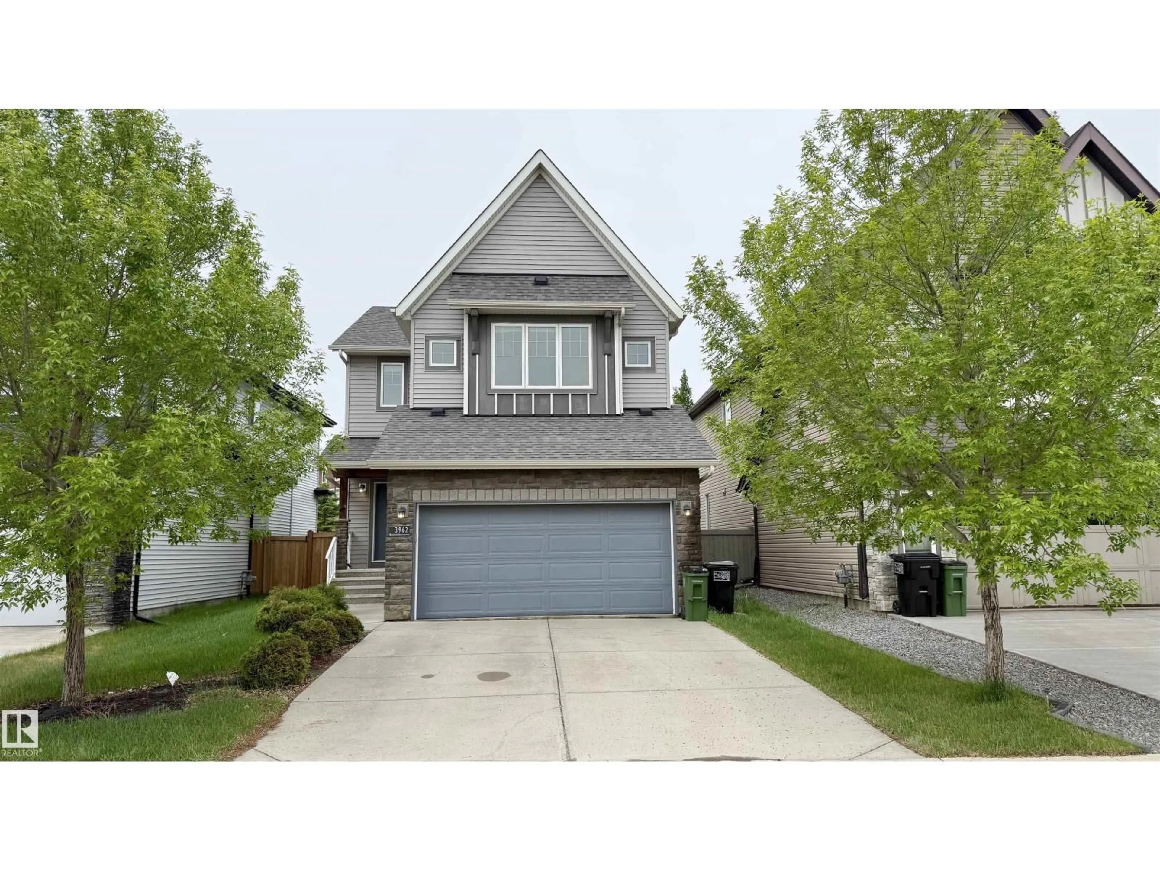 Home with vinyl exterior material, street for SW - 3962 CLAXTON LO, Edmonton Alberta T6W1Y7