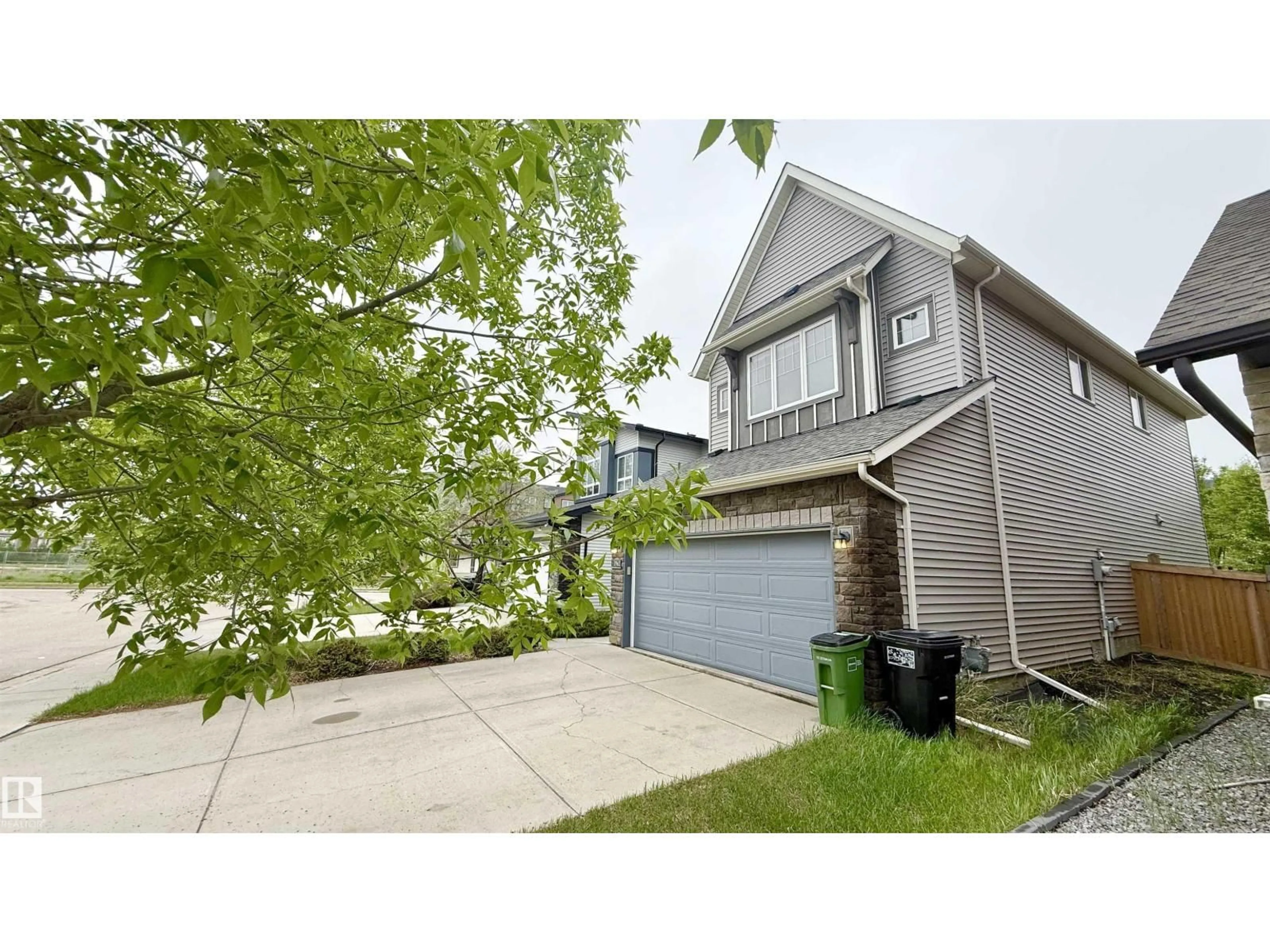 Home with vinyl exterior material, street for SW - 3962 CLAXTON LO, Edmonton Alberta T6W1Y7