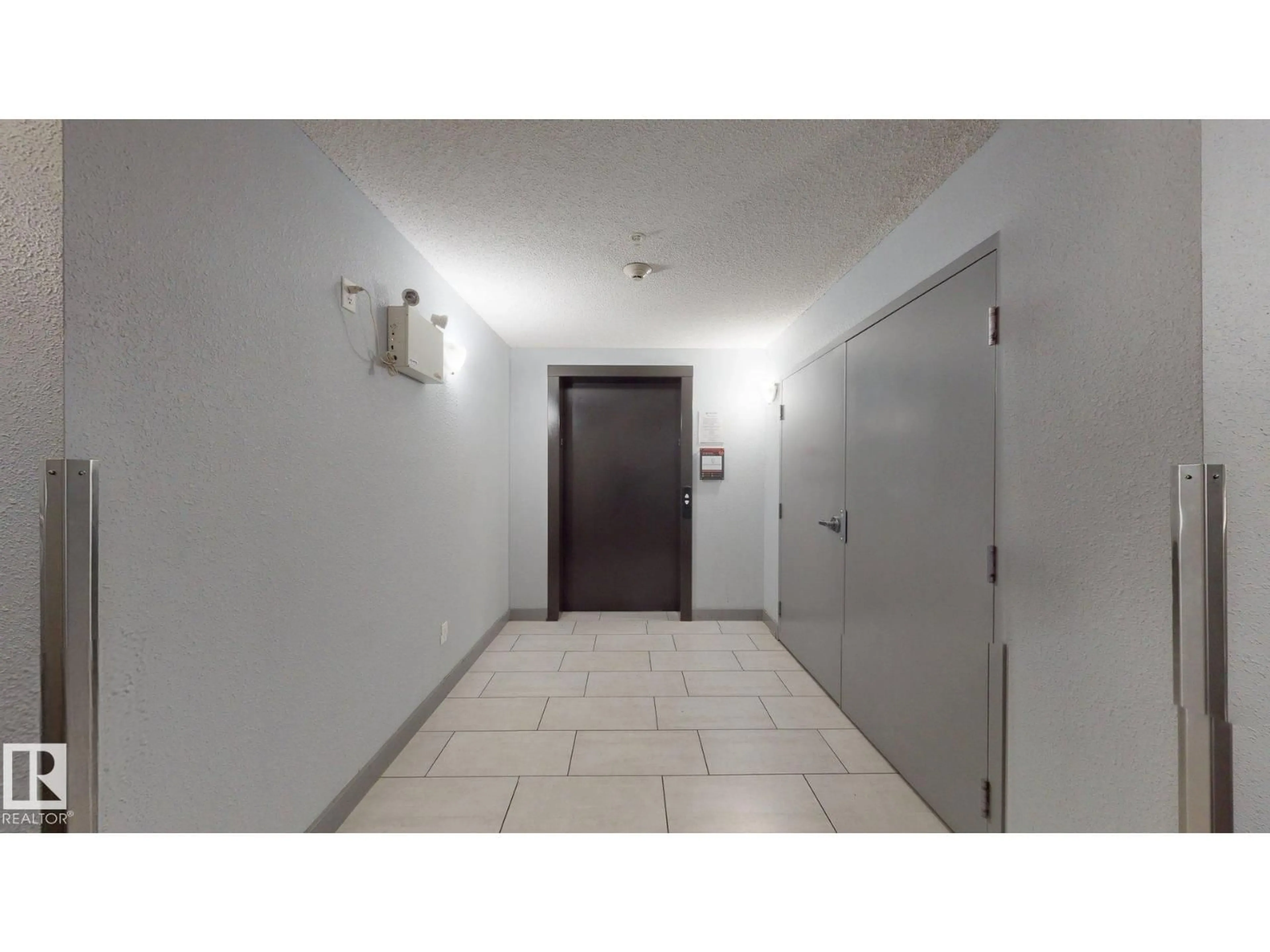 Indoor foyer for #207 - 11816 22 AV, Edmonton Alberta T6W2A2