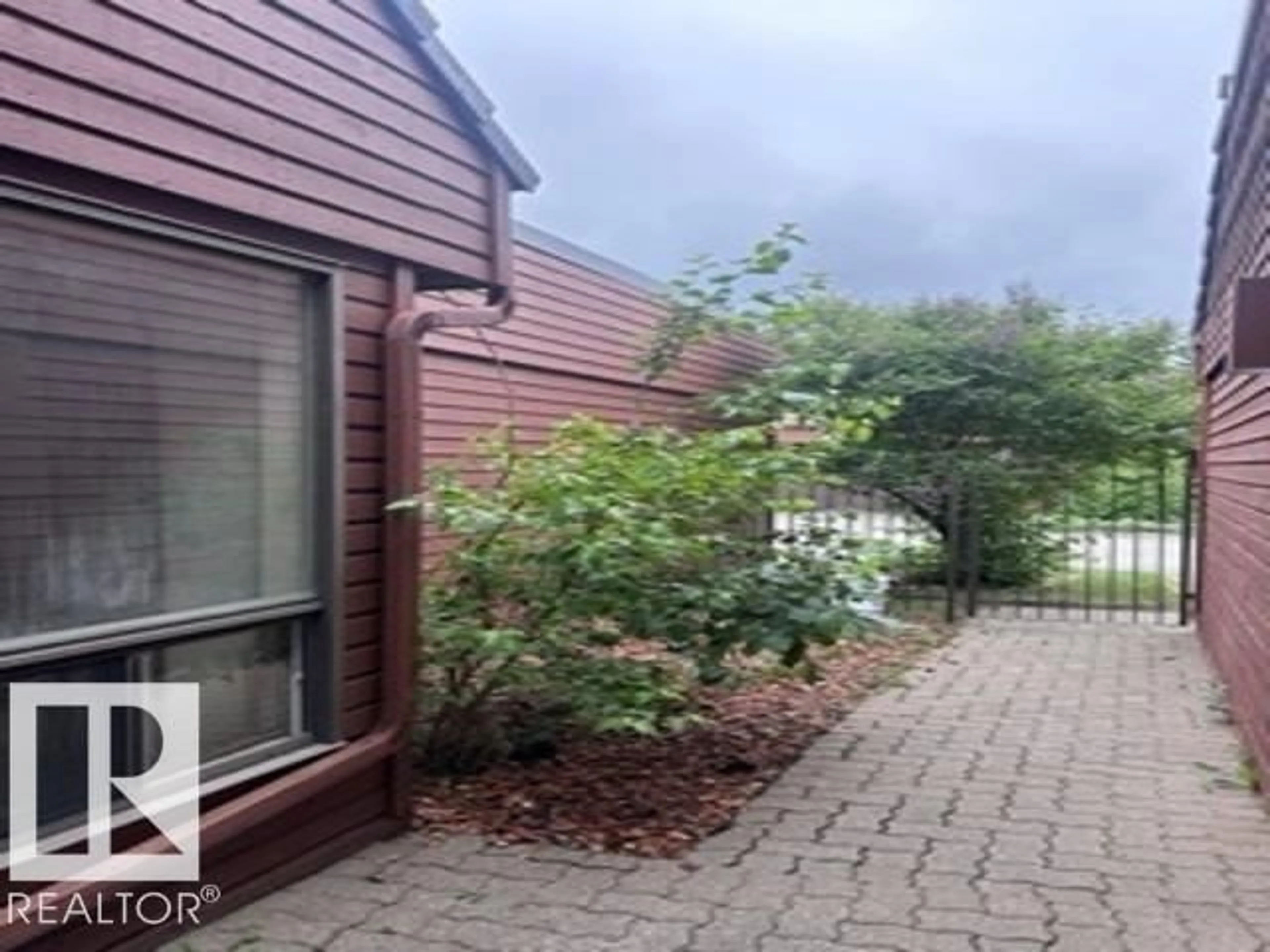 A pic from outside/outdoor area/front of a property/back of a property/a pic from drone, unknown for #23 - 500 LESSARD DR, Edmonton Alberta T6M1G1