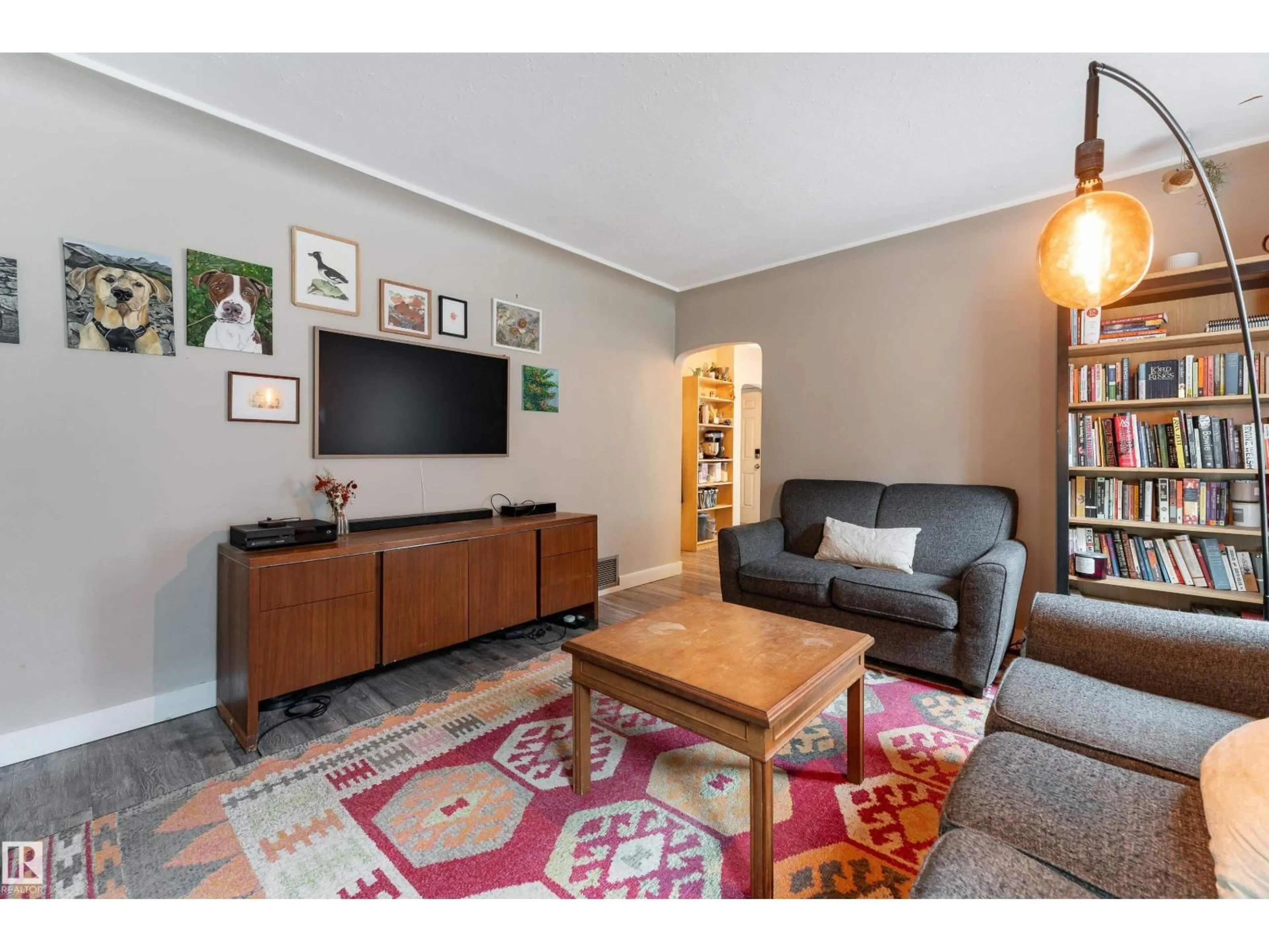 Living room with furniture, unknown for NW - 11228 67 ST, Edmonton Alberta T5B1L1