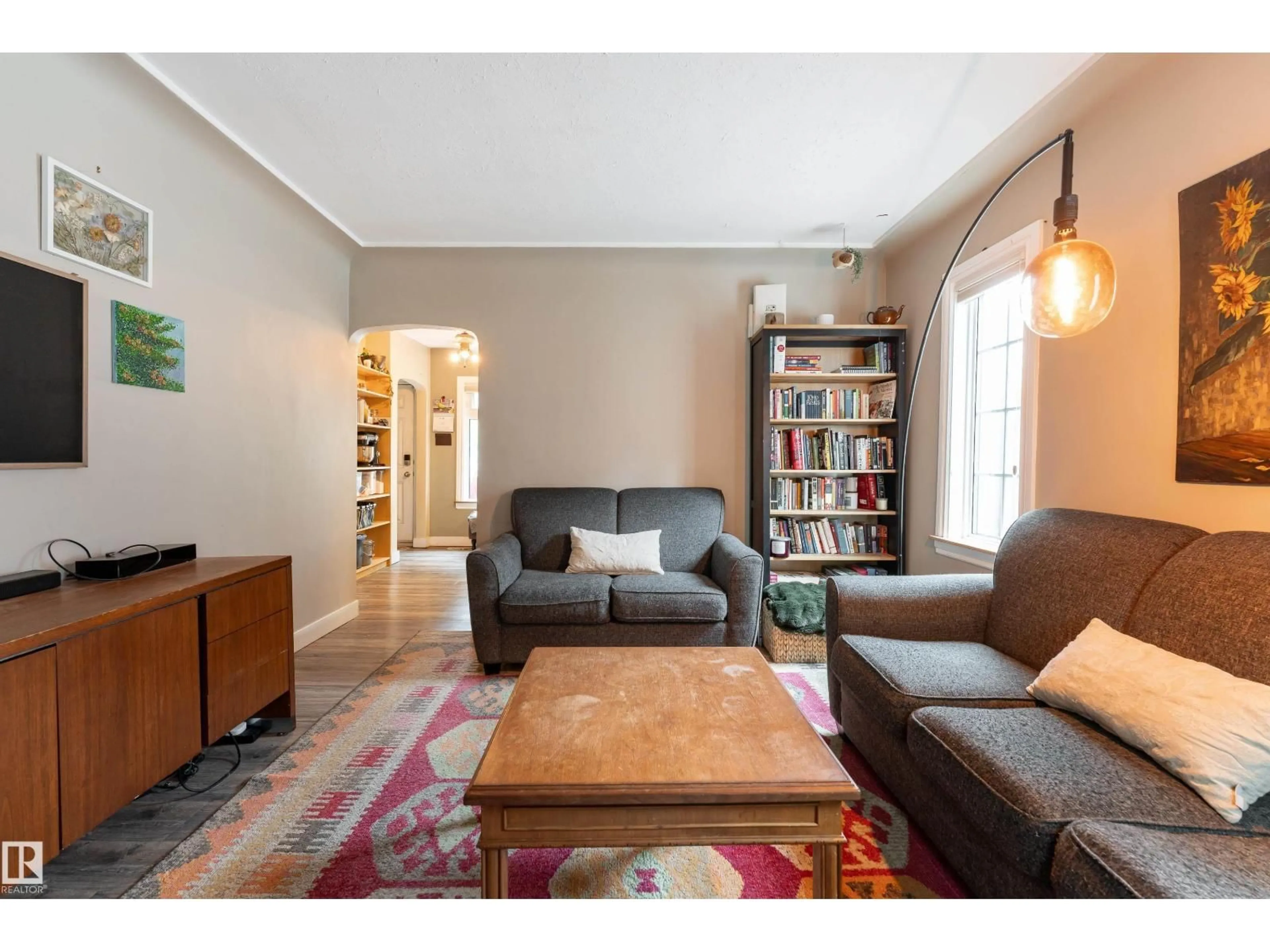 Living room with furniture, unknown for NW - 11228 67 ST, Edmonton Alberta T5B1L1