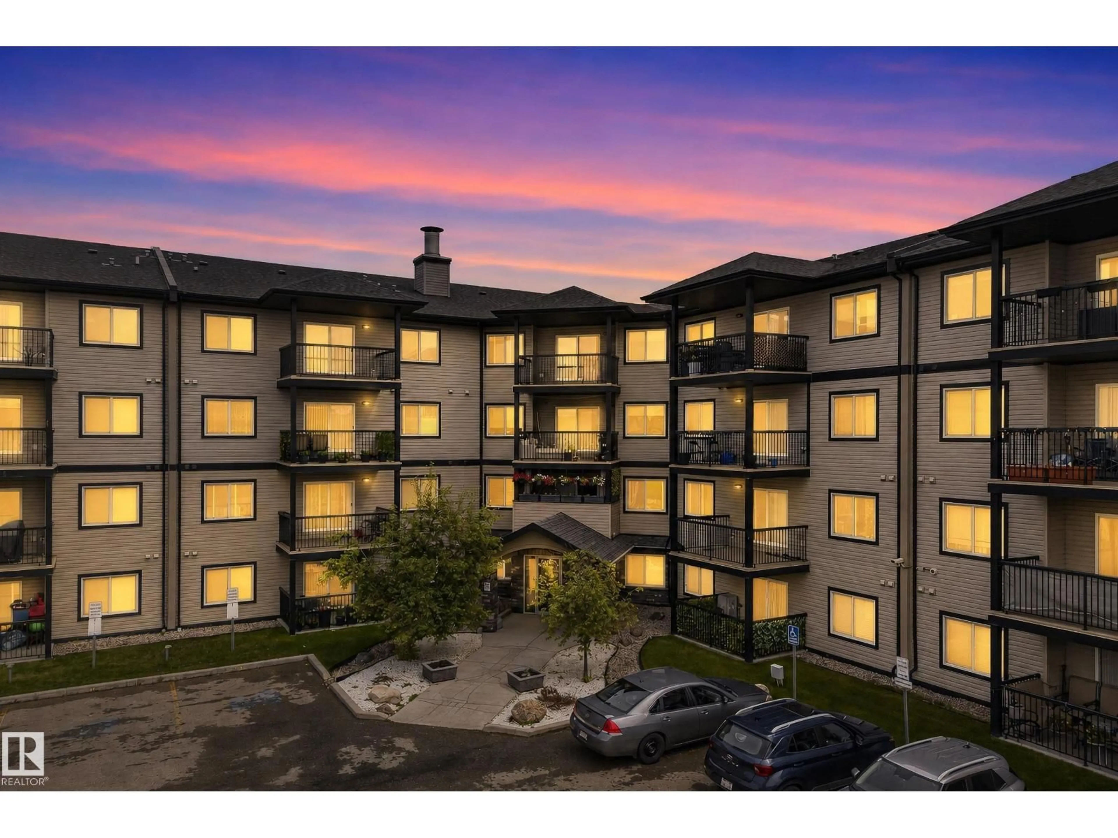 A pic from outside/outdoor area/front of a property/back of a property/a pic from drone, building for #414 - 5951 165 AV, Edmonton Alberta T5Y0J6