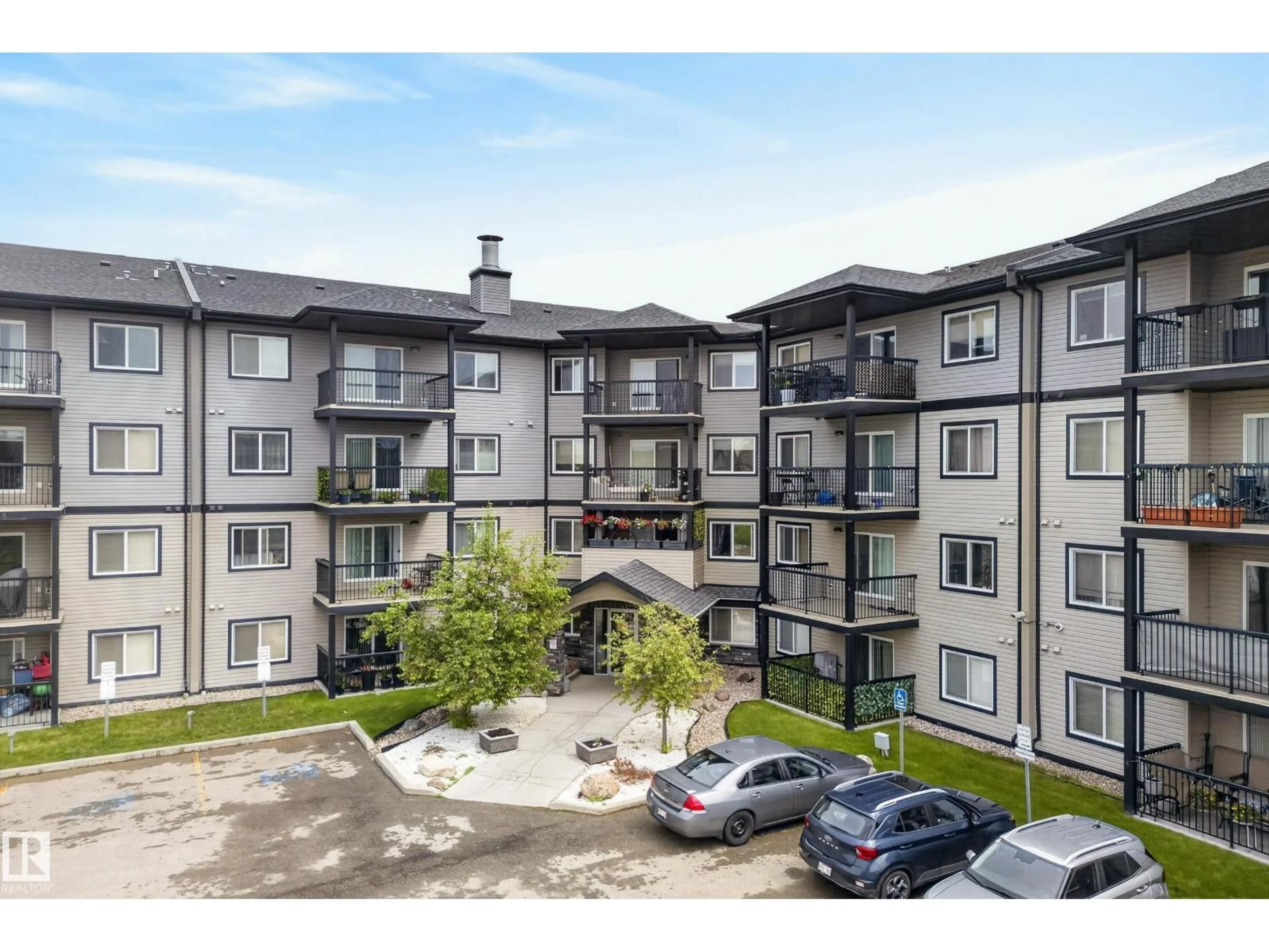 A pic from outside/outdoor area/front of a property/back of a property/a pic from drone, unknown for #414 - 5951 165 AV, Edmonton Alberta T5Y0J6