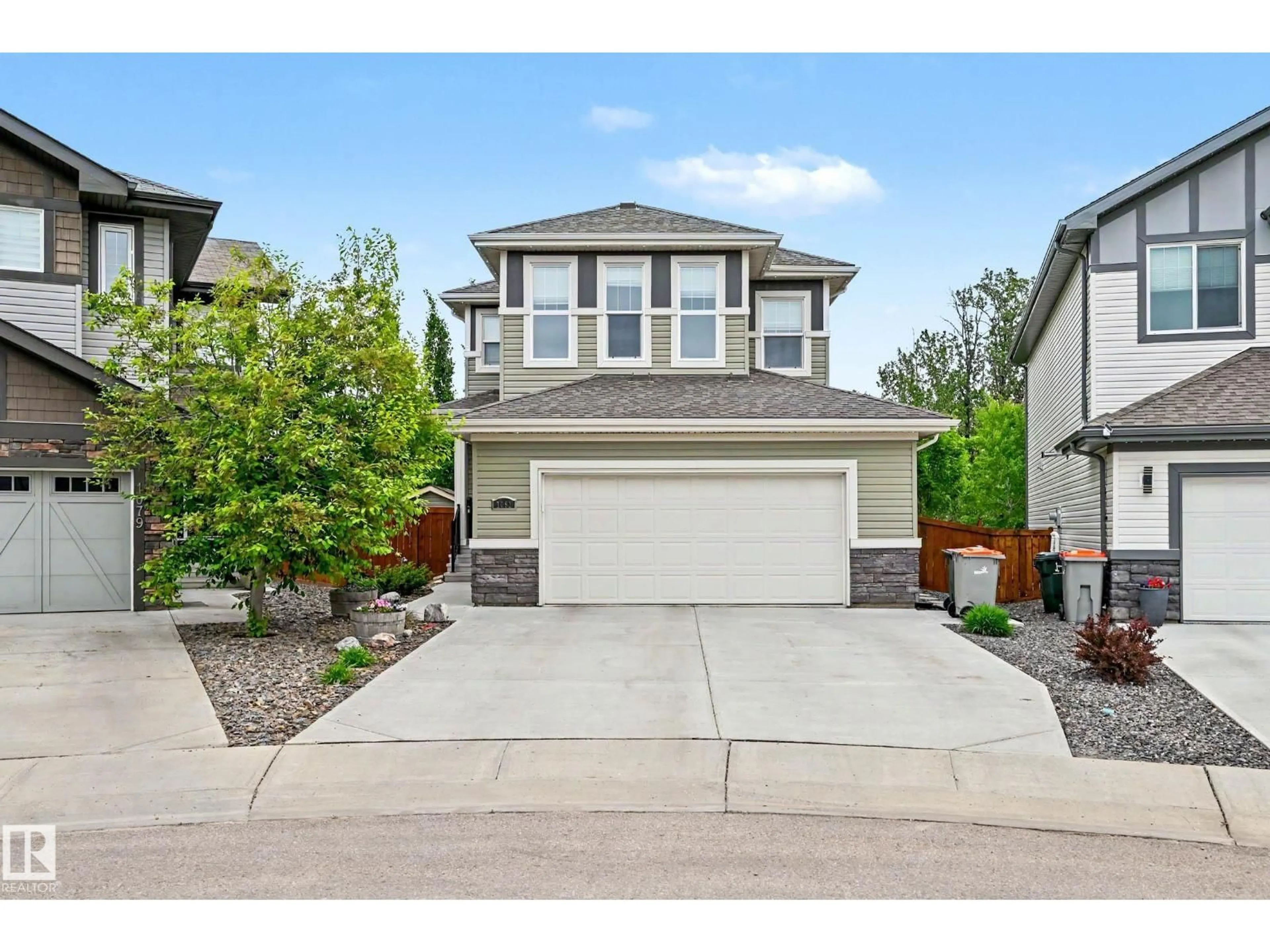Home with vinyl exterior material, street for 1081 SOUTH CREEK WD, Stony Plain Alberta T7Z0L9