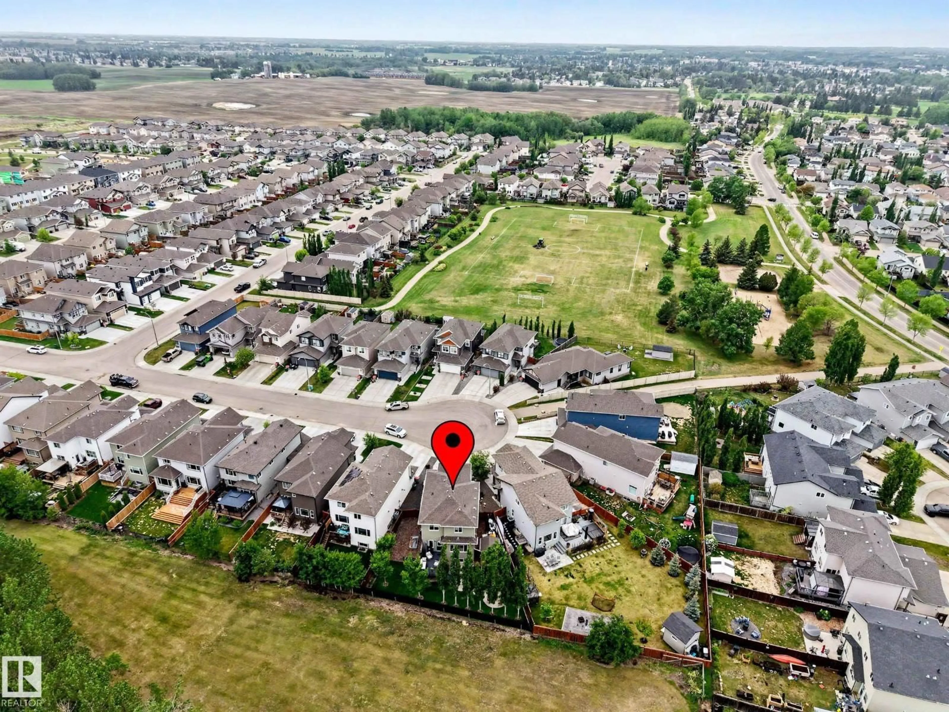 A pic from outside/outdoor area/front of a property/back of a property/a pic from drone, street for 1081 SOUTH CREEK WD, Stony Plain Alberta T7Z0L9