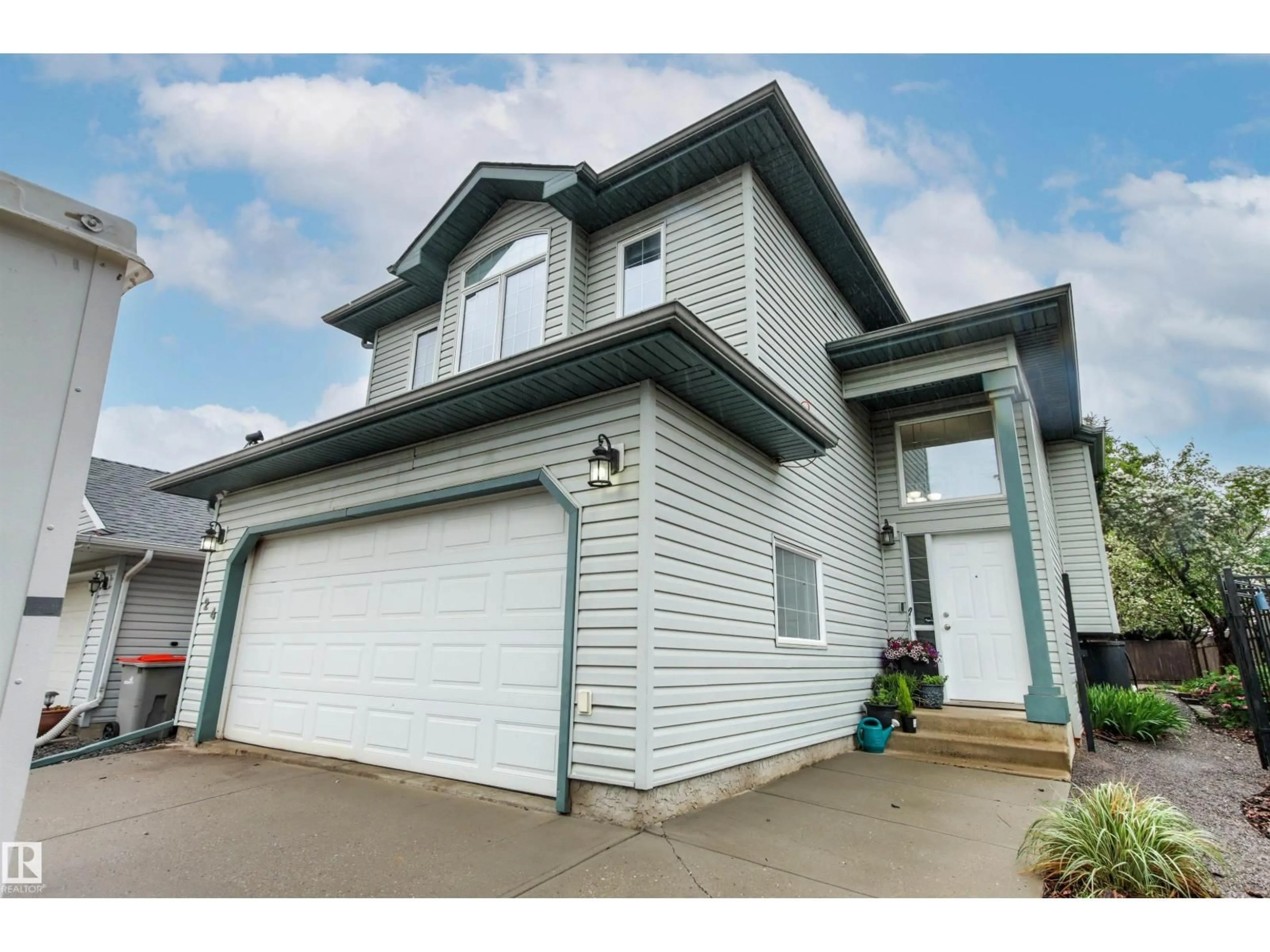 Home with vinyl exterior material, street for 24 EGERLAND PL, Stony Plain Alberta T7Z2W5