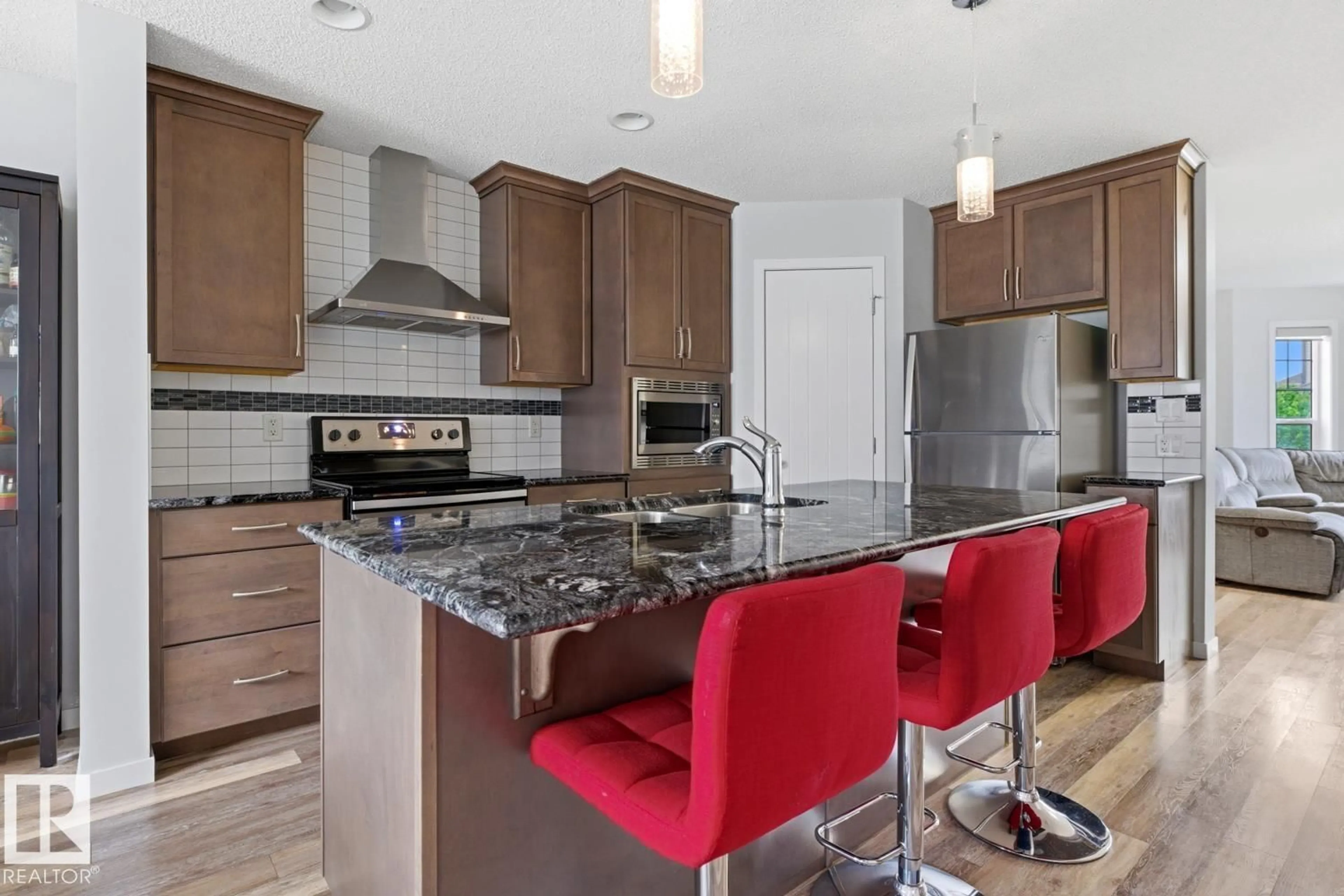Open concept kitchen, unknown for 17844 61 ST, Edmonton Alberta T5Y3T3