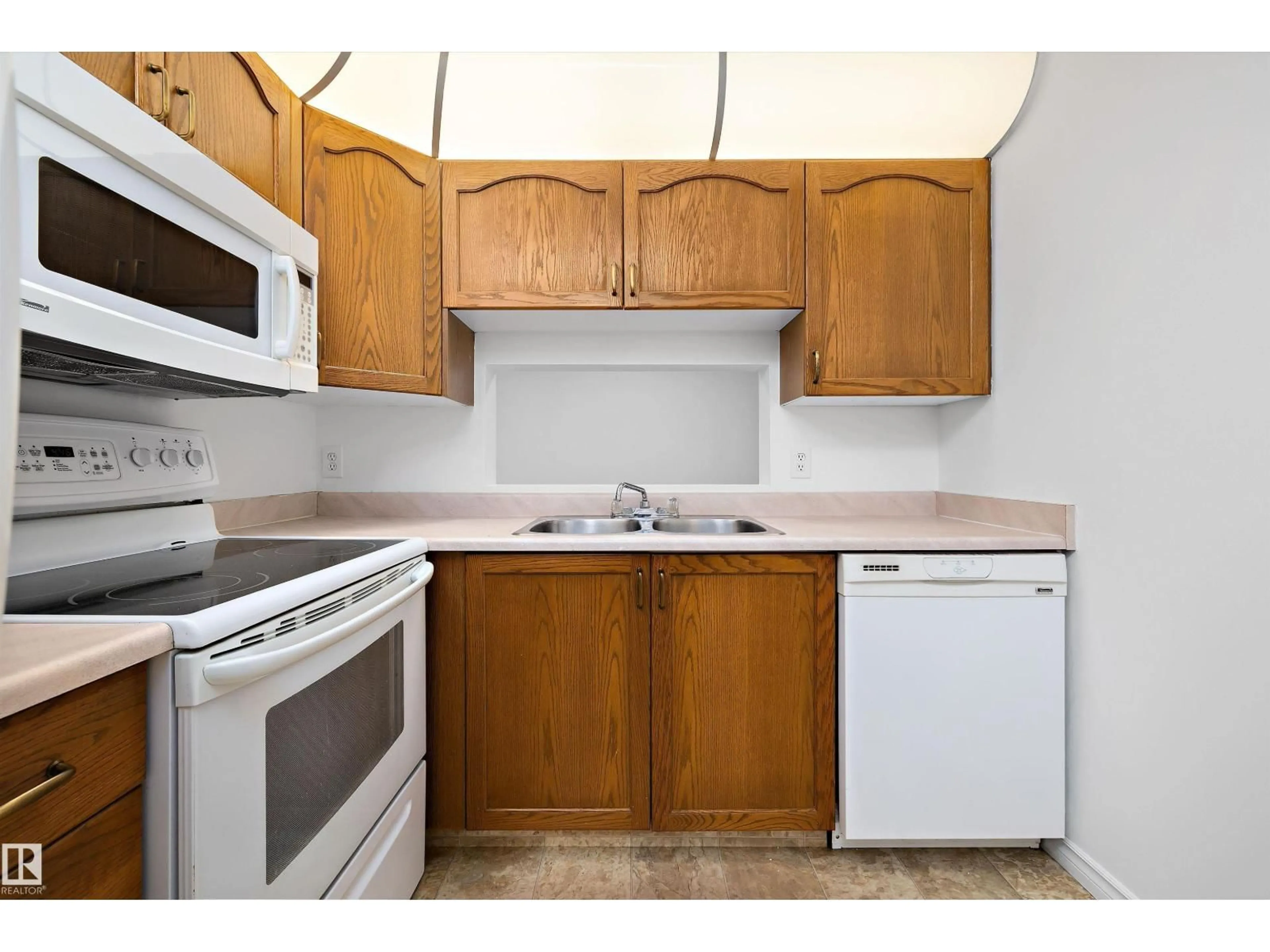 Standard kitchen, unknown for #111 - 9619 174 ST NW, Edmonton Alberta T5T6C6