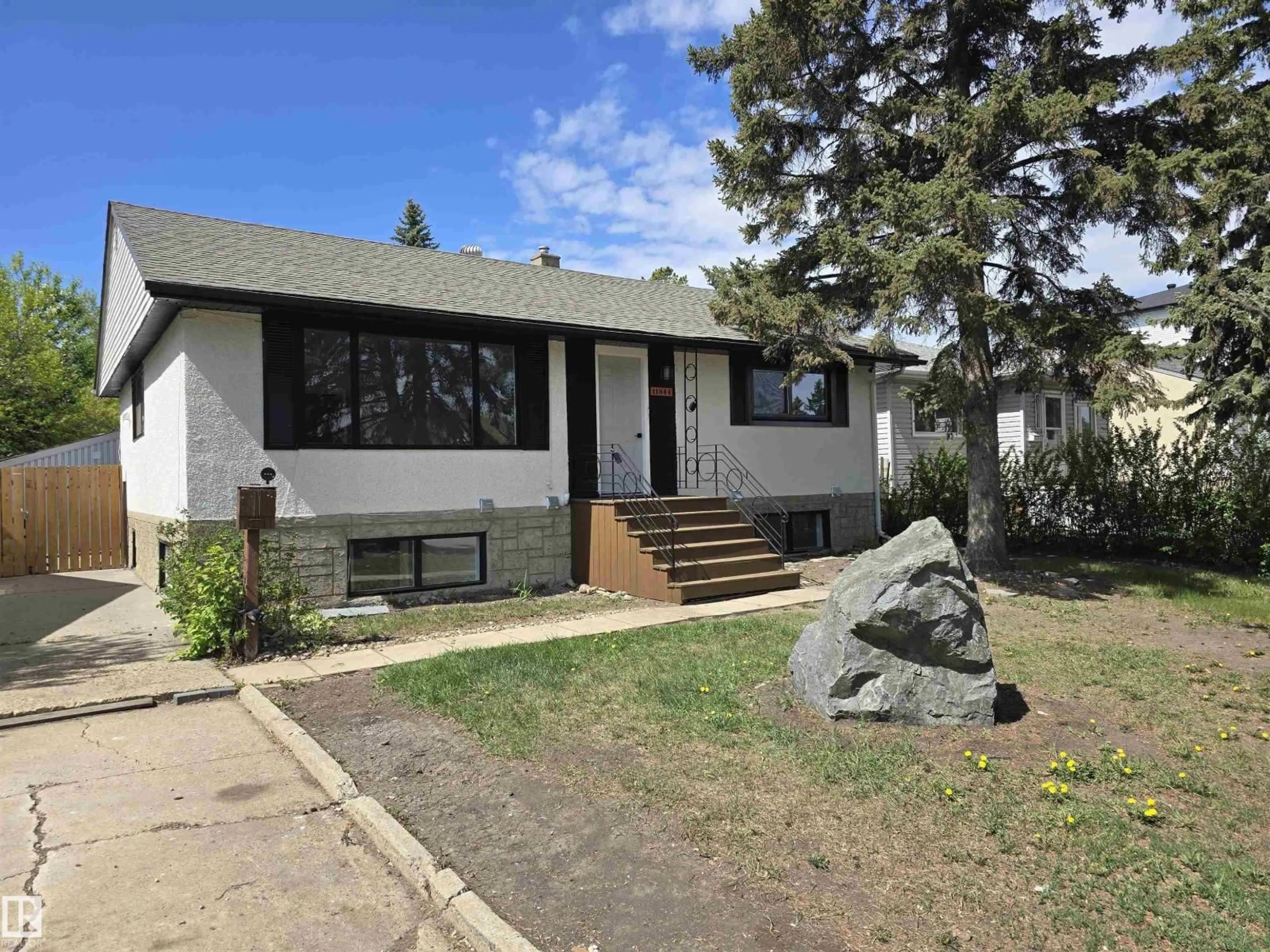 Home with vinyl exterior material, street for 11844 ST ALBERT TR, Edmonton Alberta T5L4G4