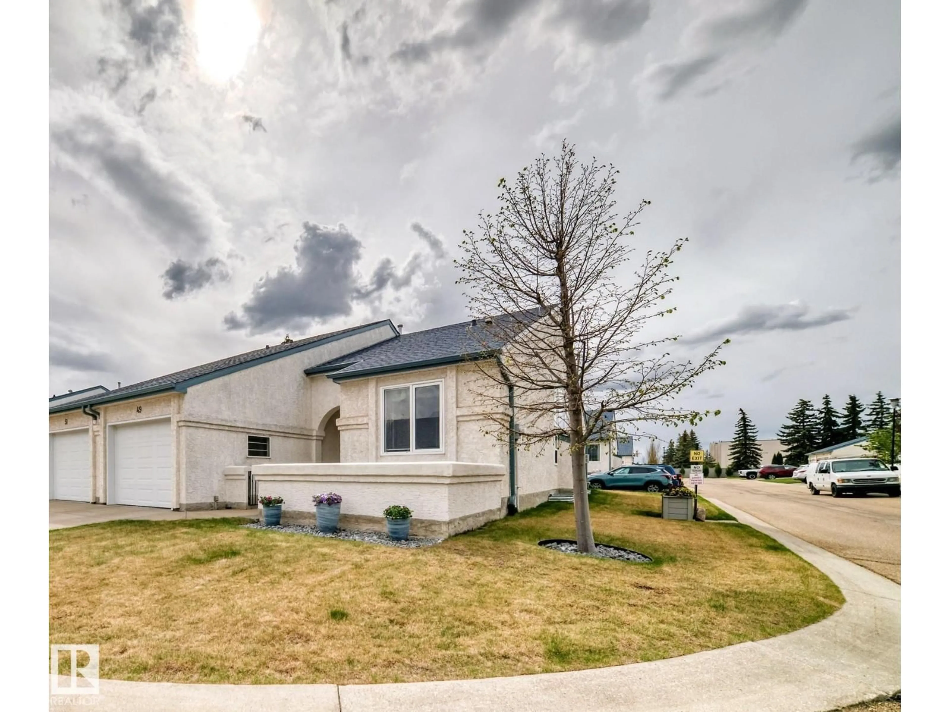 A pic from outside/outdoor area/front of a property/back of a property/a pic from drone, street for 9718 - 49 176 ST, Edmonton Alberta T5T6B8