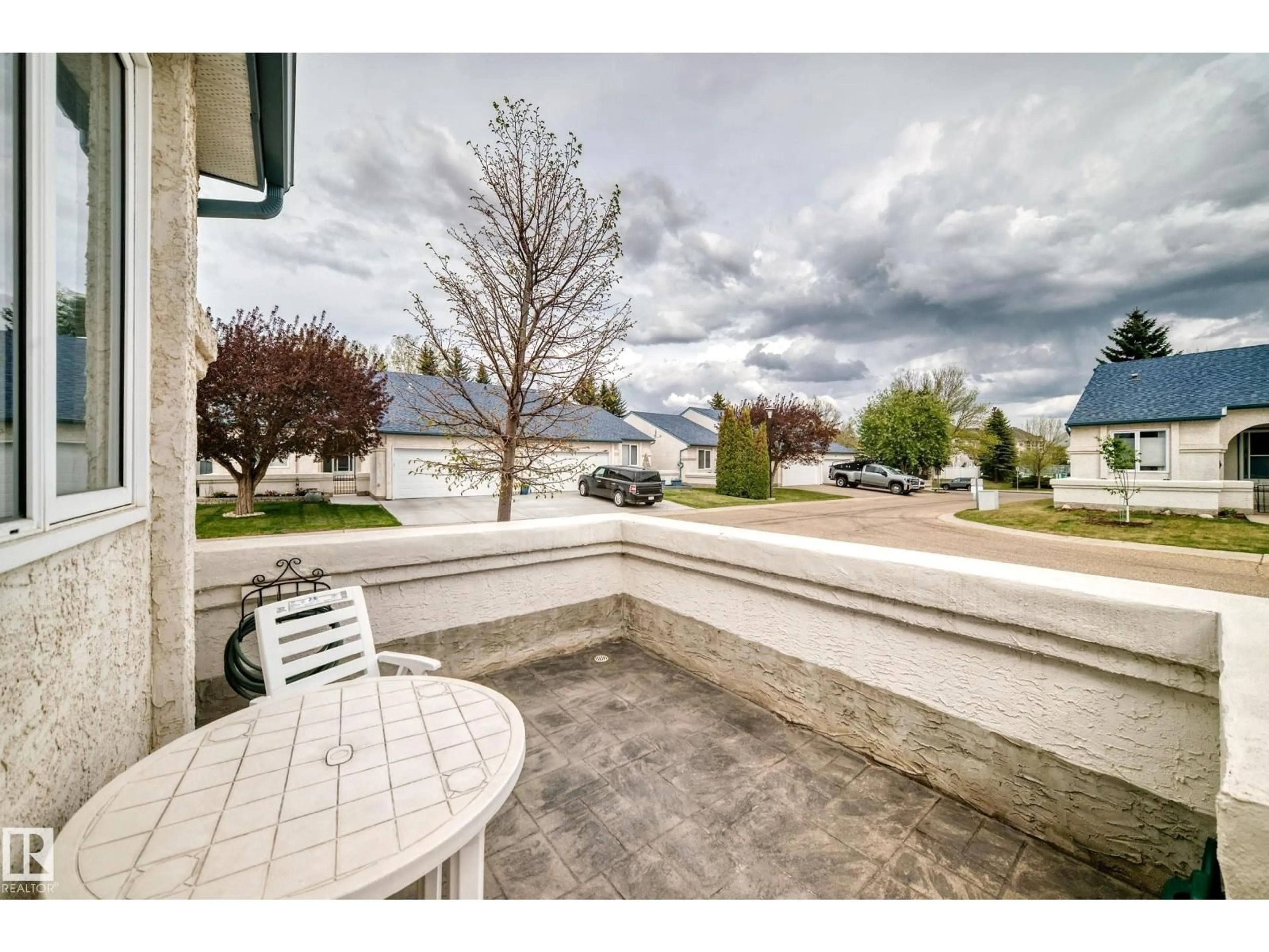 Patio, water/lake/river/ocean view for 9718 - 49 176 ST, Edmonton Alberta T5T6B8