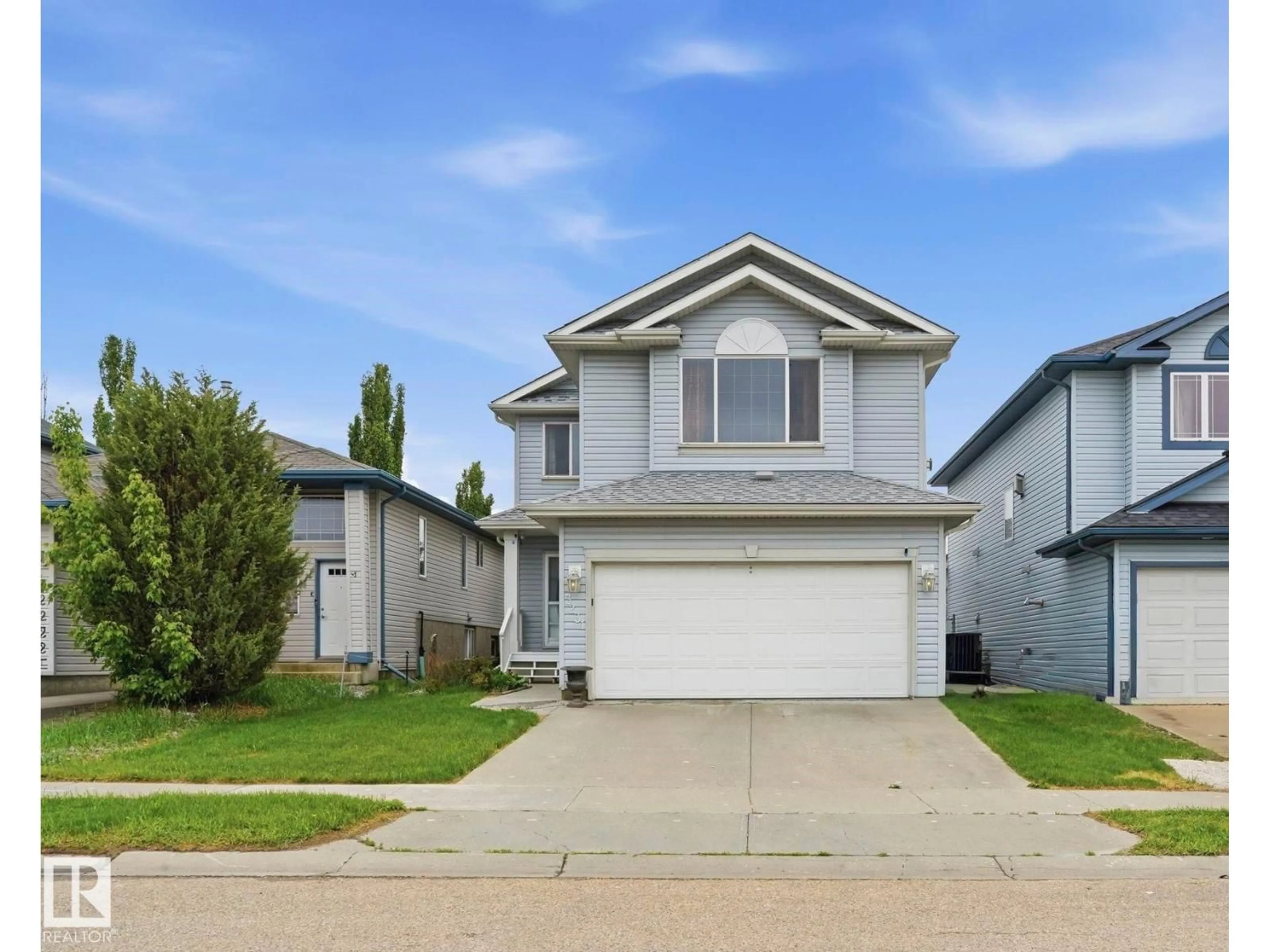 Home with vinyl exterior material, street for NW - 3231 28A AV, Edmonton Alberta T6T1T1
