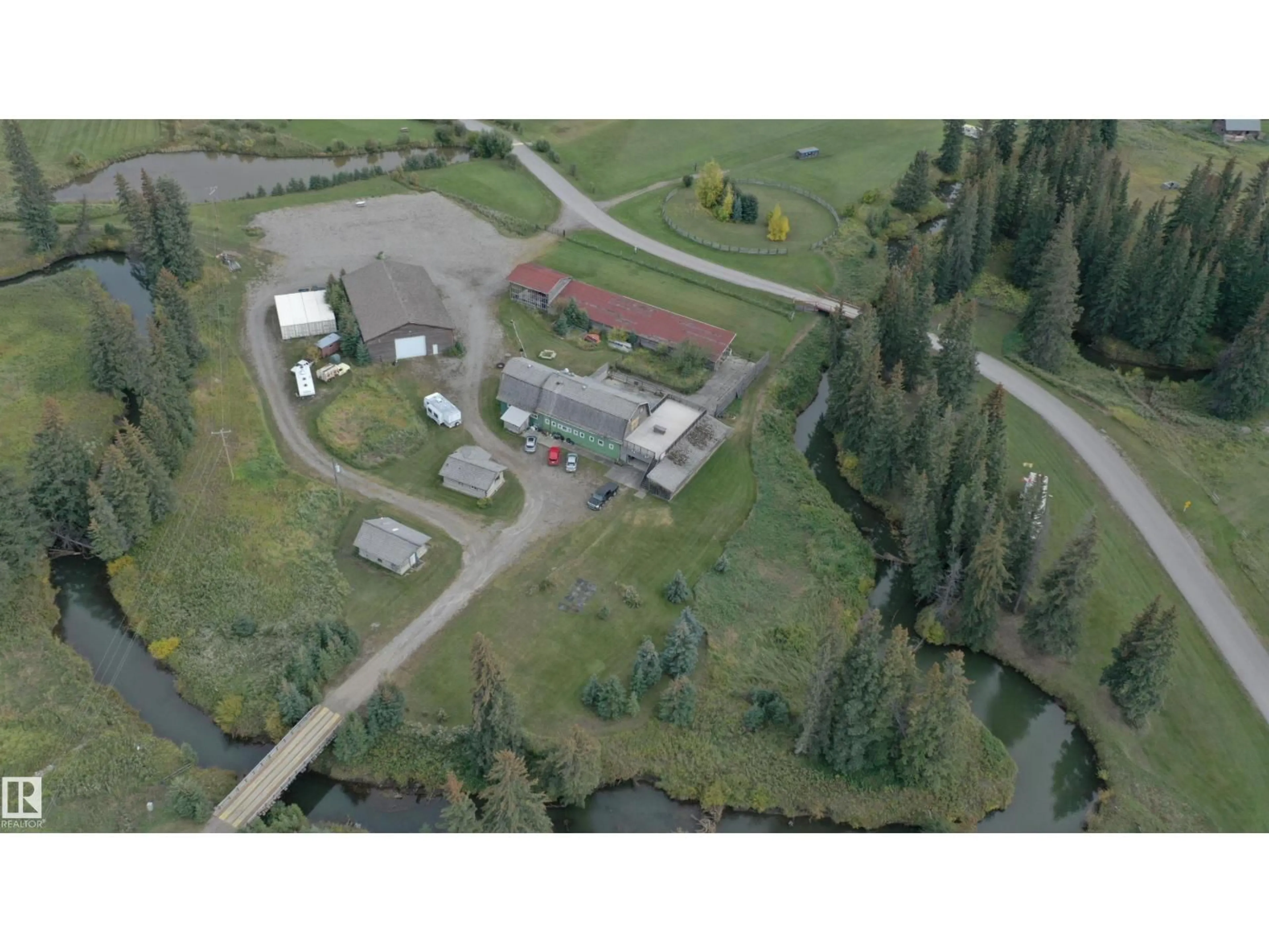 A pic from outside/outdoor area/front of a property/back of a property/a pic from drone, unknown for 50409B HIGHWAY 16, Rural Yellowhead Alberta T7V1X3