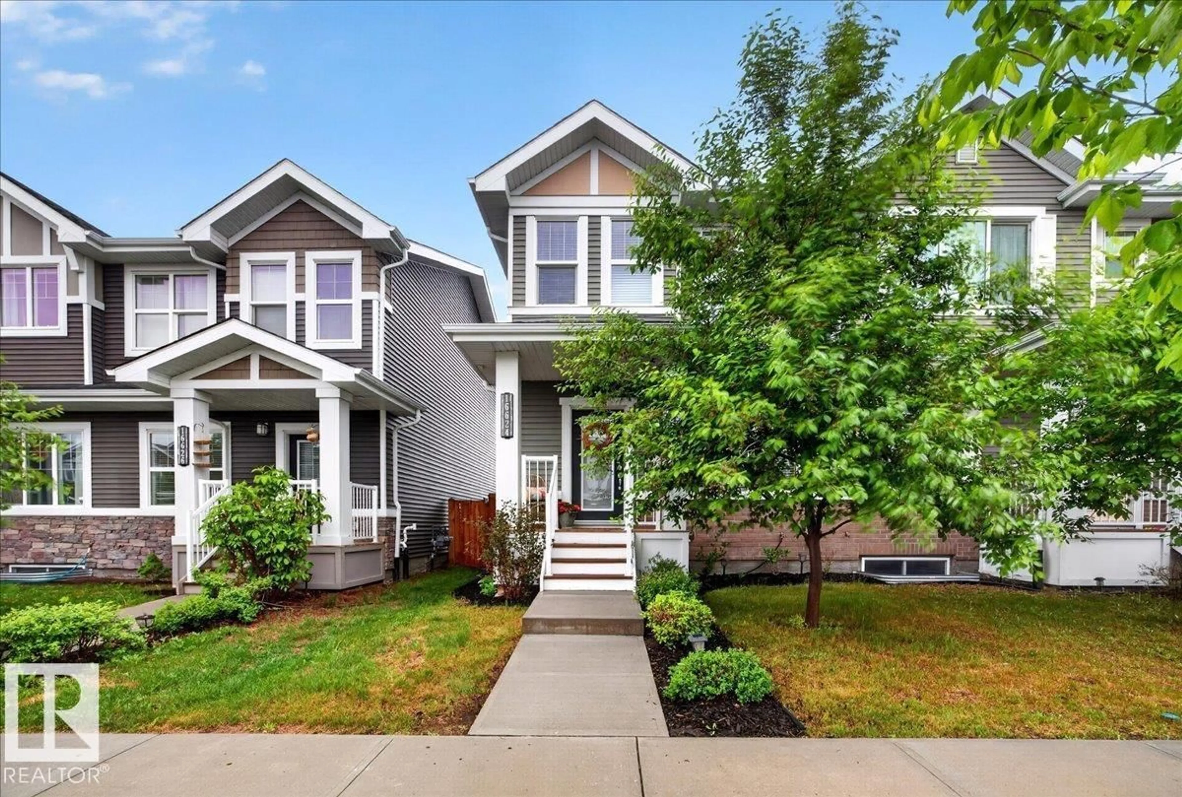 Home with vinyl exterior material, street for SW - 16624 31 AV, Edmonton Alberta T6W4P8