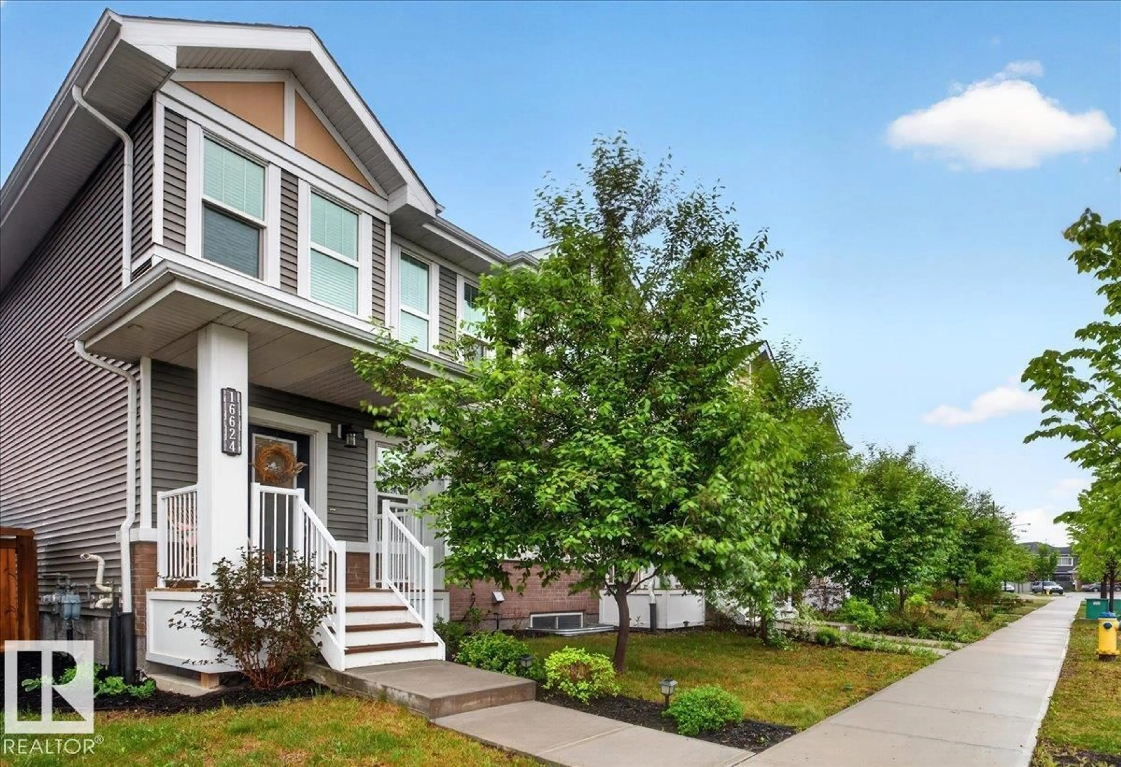 Home with vinyl exterior material, street for SW - 16624 31 AV, Edmonton Alberta T6W4P8