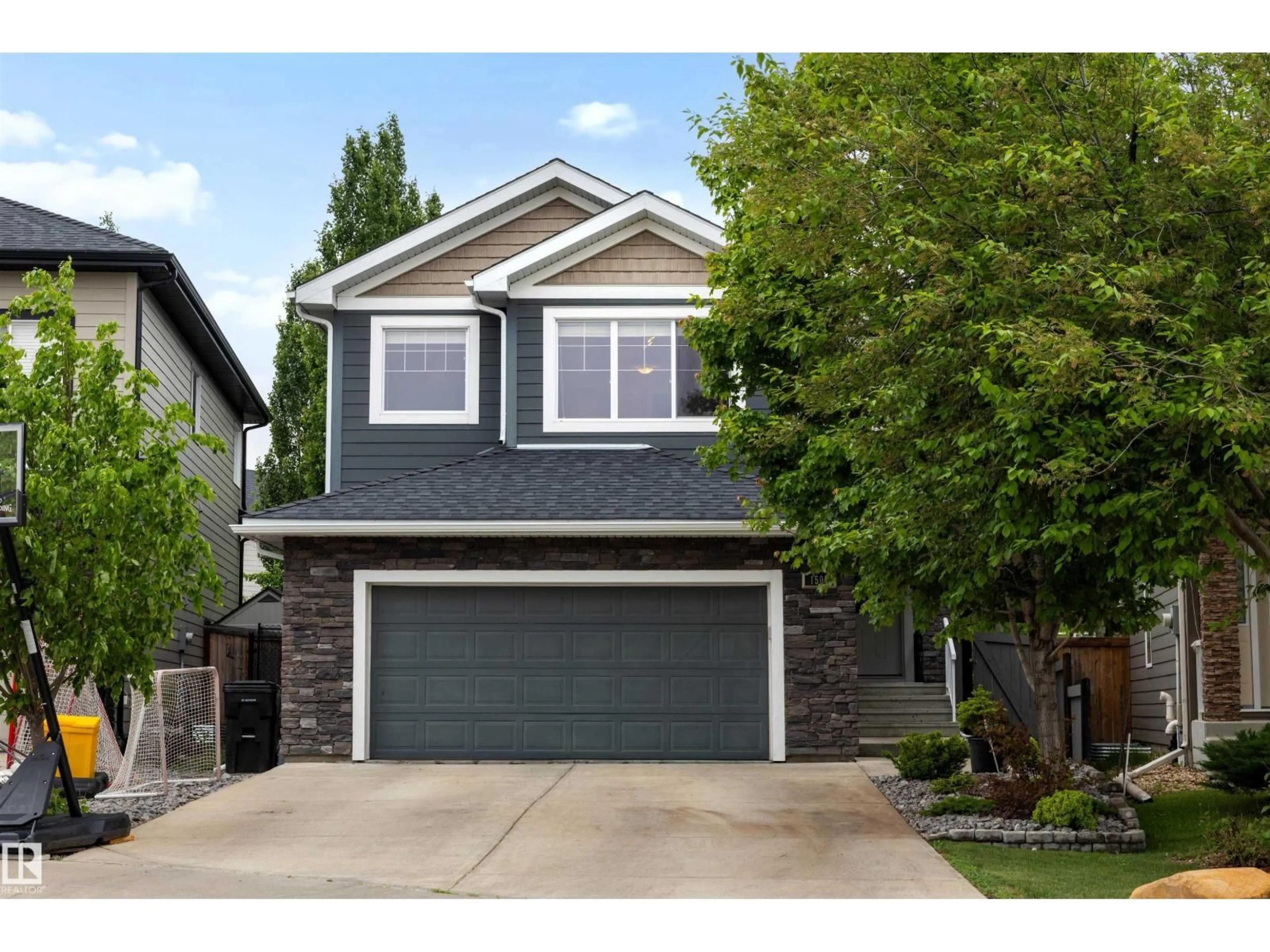 Home with vinyl exterior material, street for 1507 WATES PL, Edmonton Alberta T6W0T9