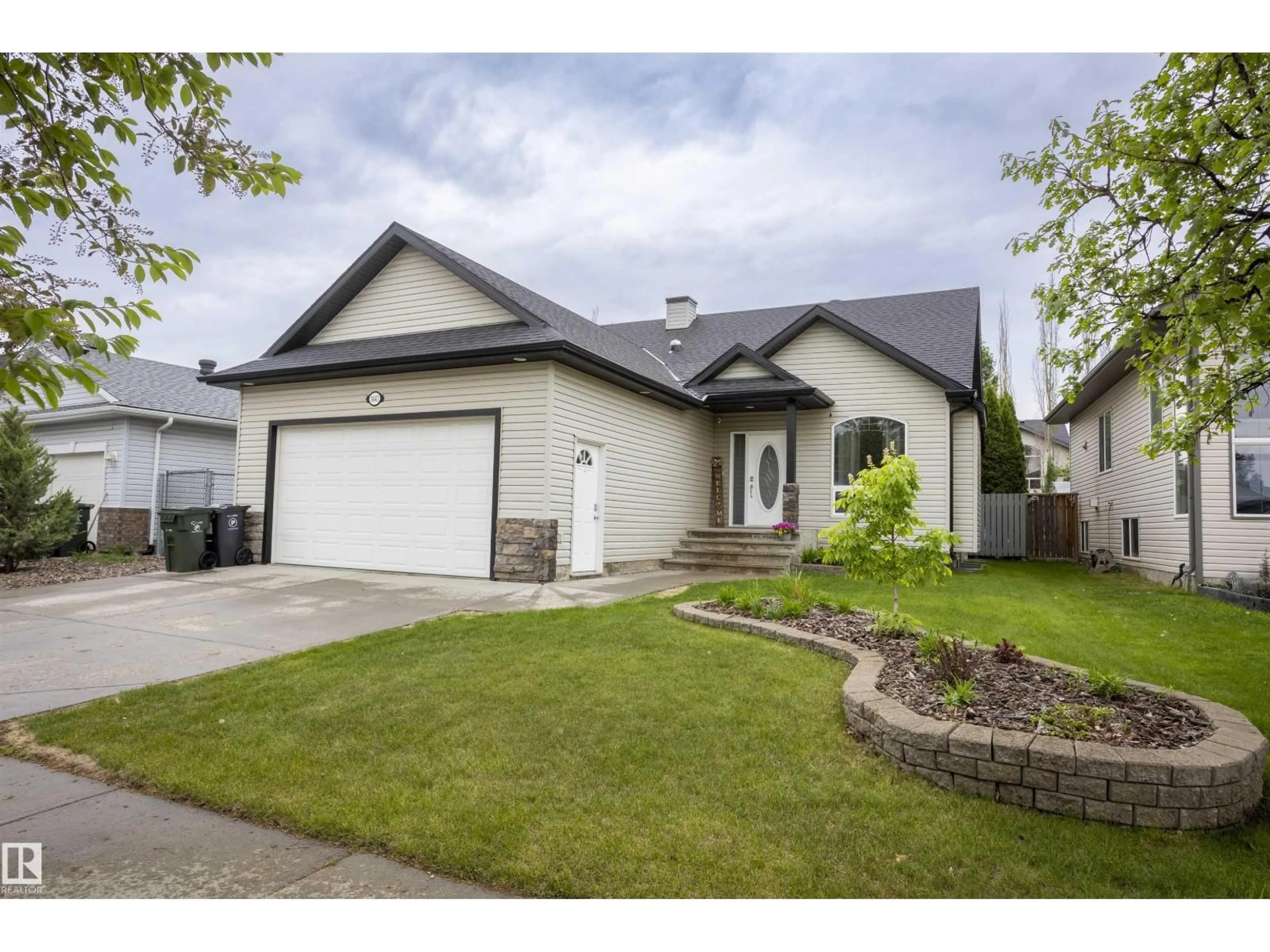 Home with vinyl exterior material, street for 1441 HIGHWOOD BV, Devon Alberta T9G2E9