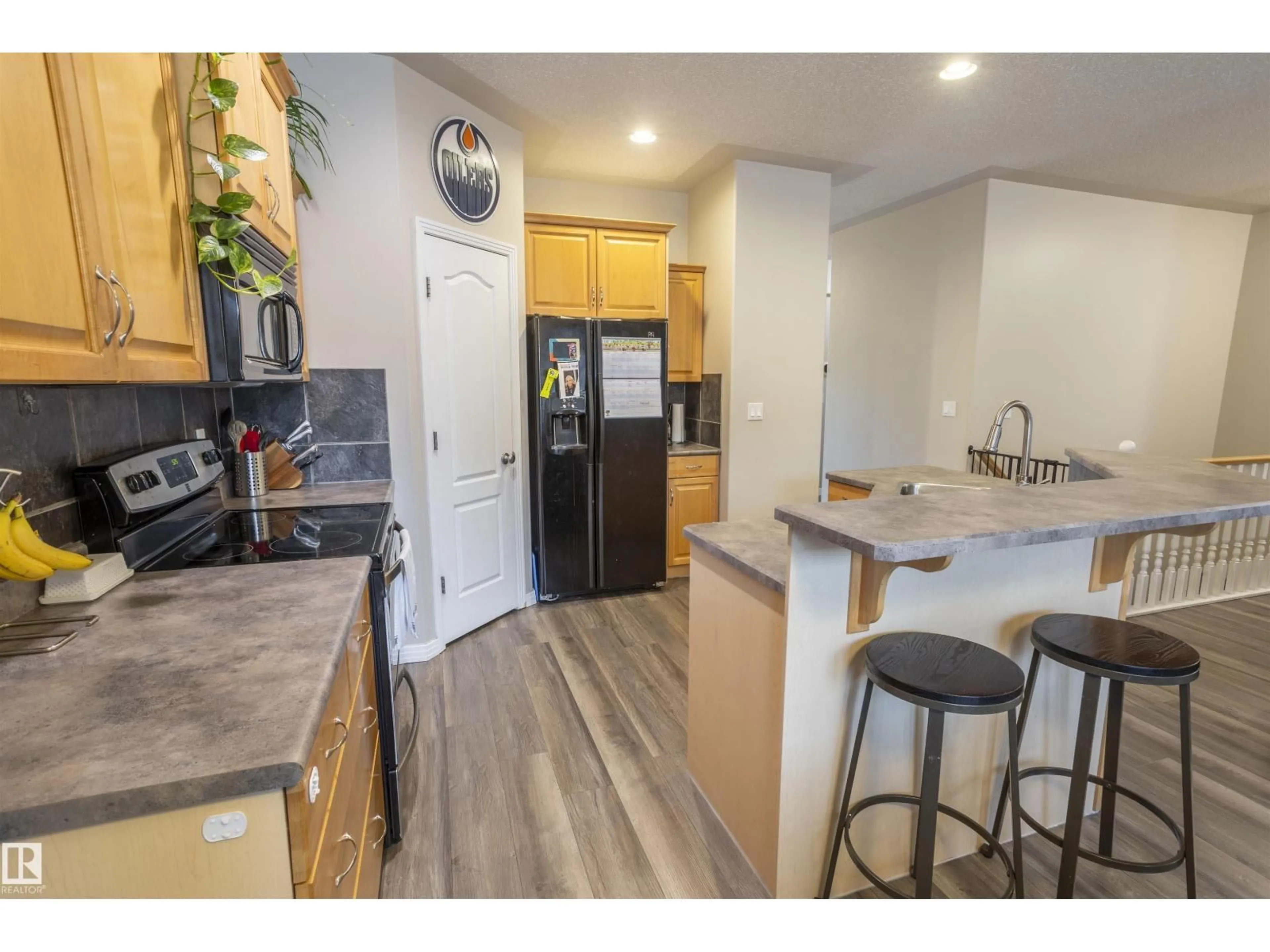 Open concept kitchen, unknown for 1441 HIGHWOOD BV, Devon Alberta T9G2E9