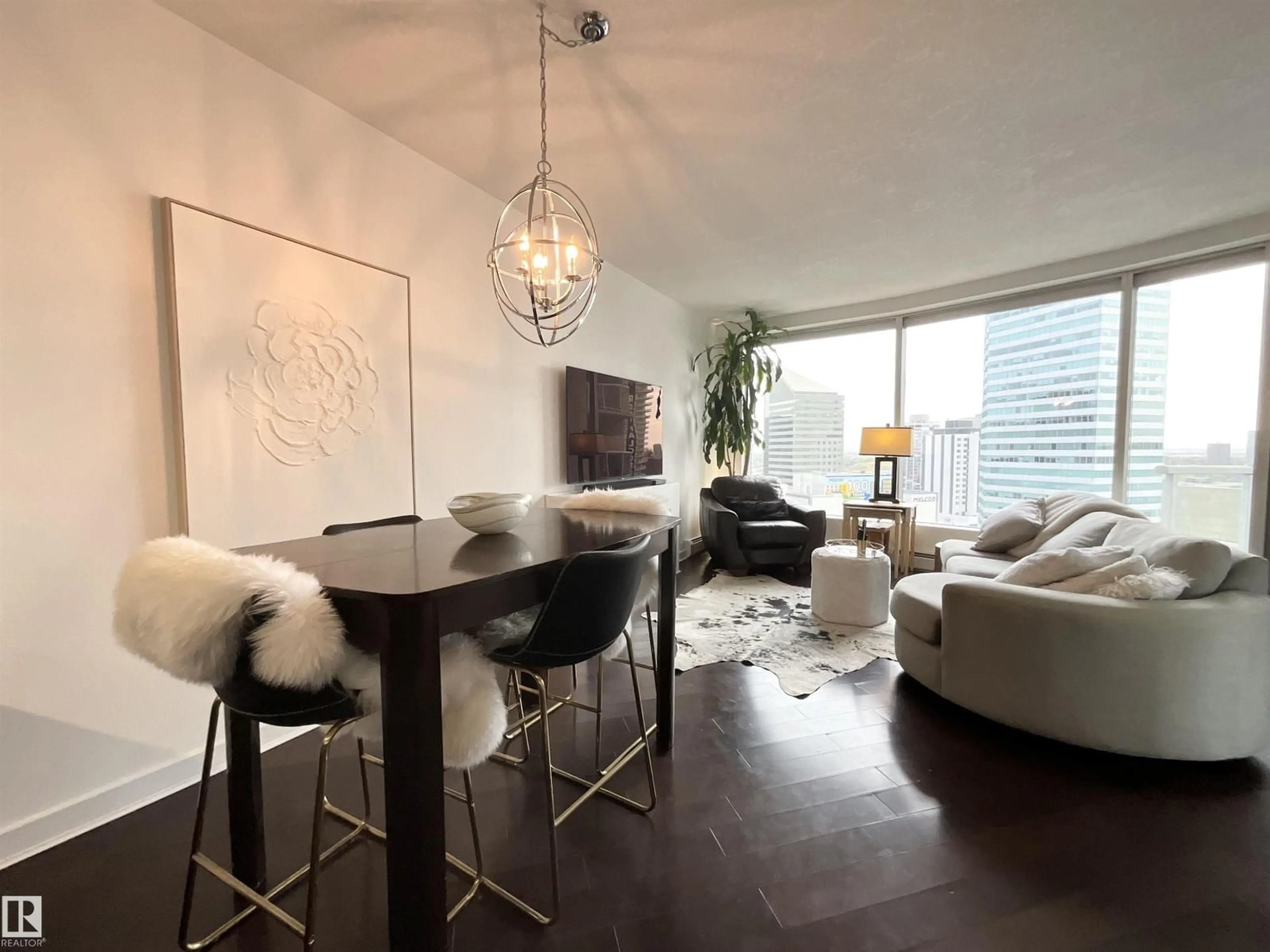 Living room with furniture, wood/laminate floor for 1504 104 ST NW, Edmonton Alberta T5J0B6