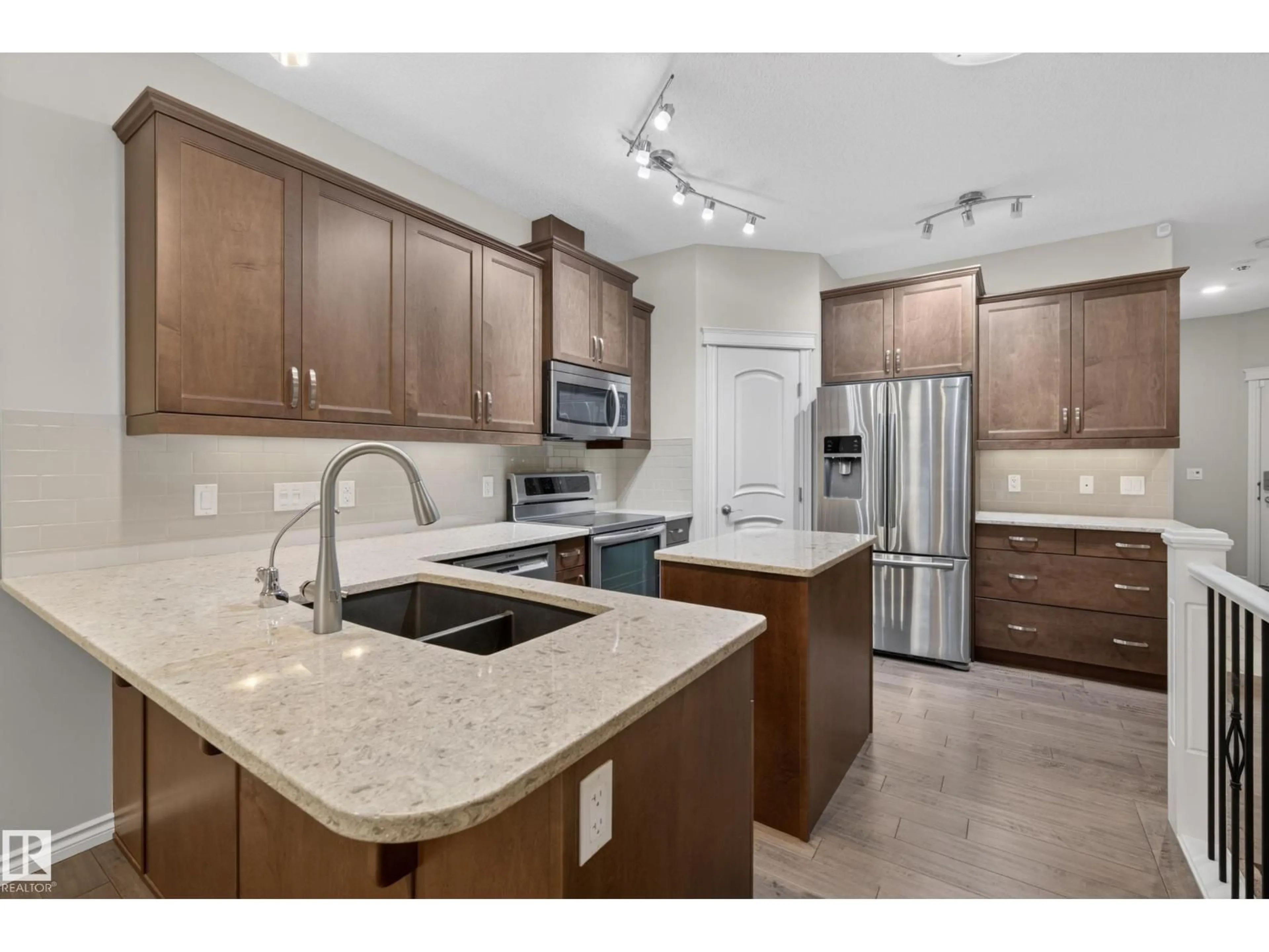 Open concept kitchen, ceramic/tile floor for 5300 - 29 SUNVIEW LN, Sherwood Park Alberta T8H0S2