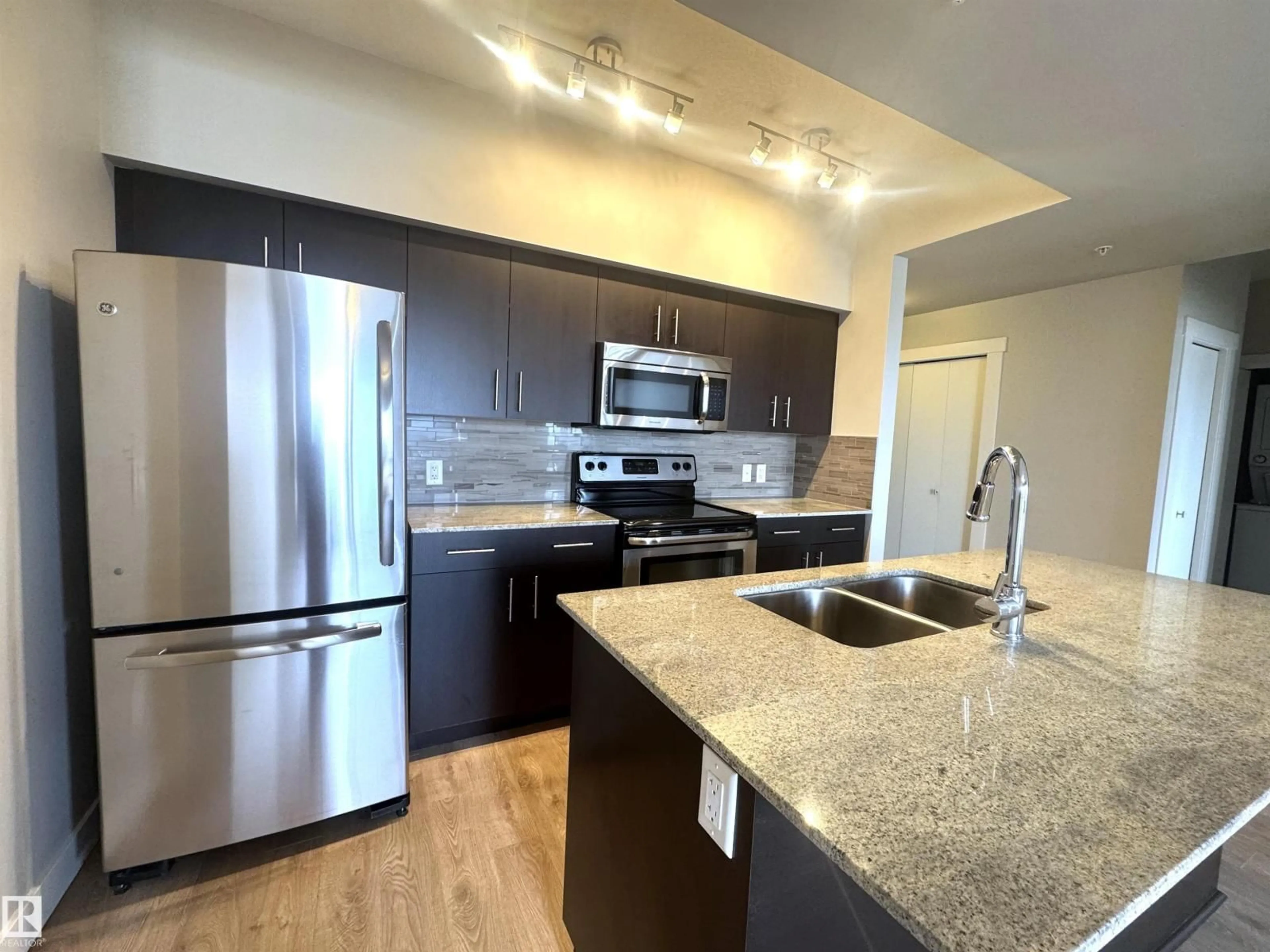 Open concept kitchen, unknown for 703 - 10226 104 ST NW, Edmonton Alberta T5J1B8