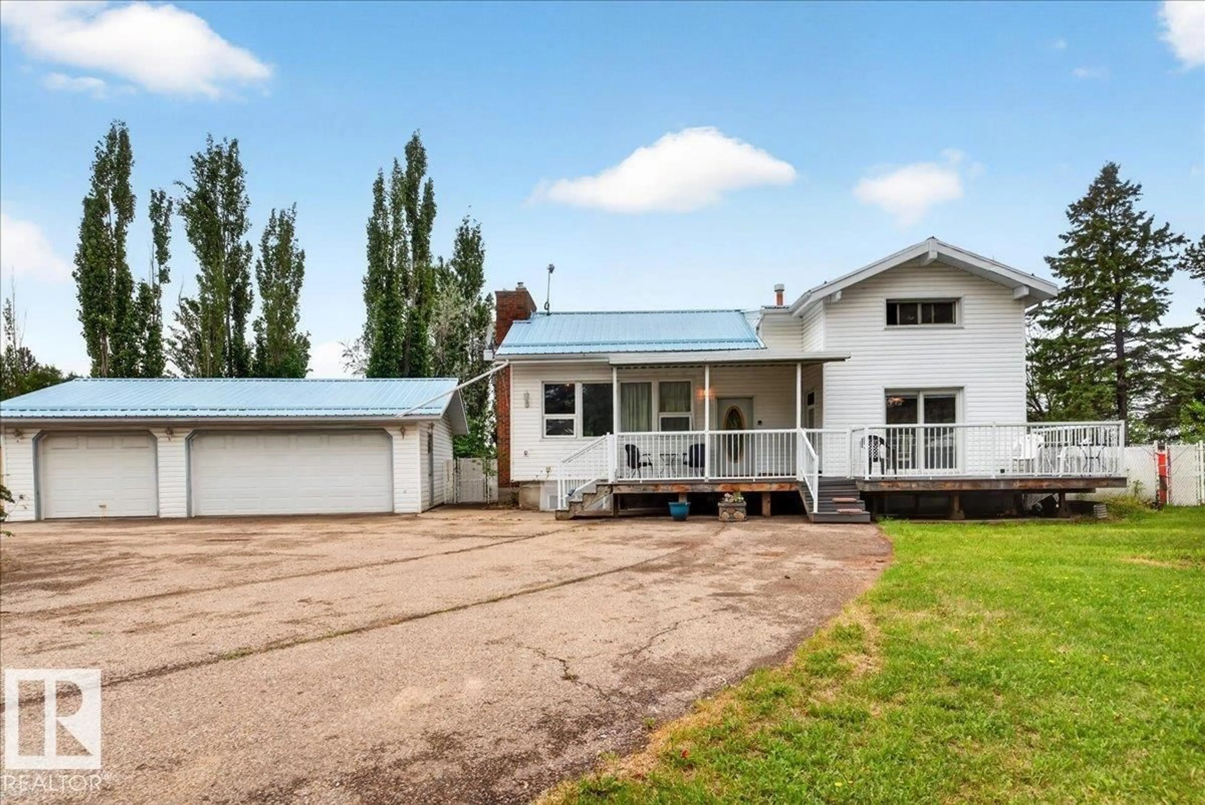 A pic from outside/outdoor area/front of a property/back of a property/a pic from drone, building for #140 - 50047 RGE RD, Rural Leduc County Alberta T4X0N8