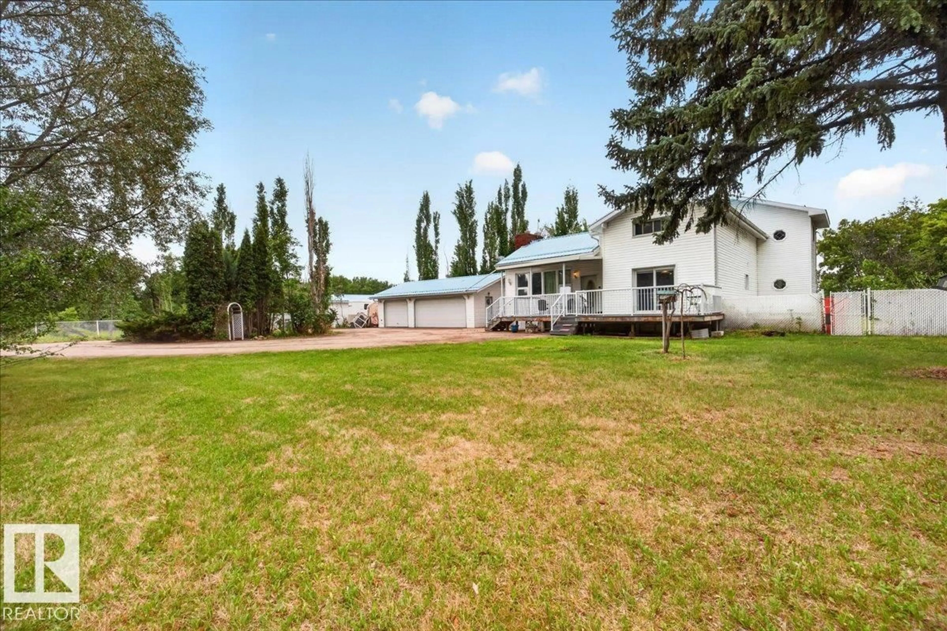 A pic from outside/outdoor area/front of a property/back of a property/a pic from drone, unknown for #140 - 50047 RGE RD, Rural Leduc County Alberta T4X0N8