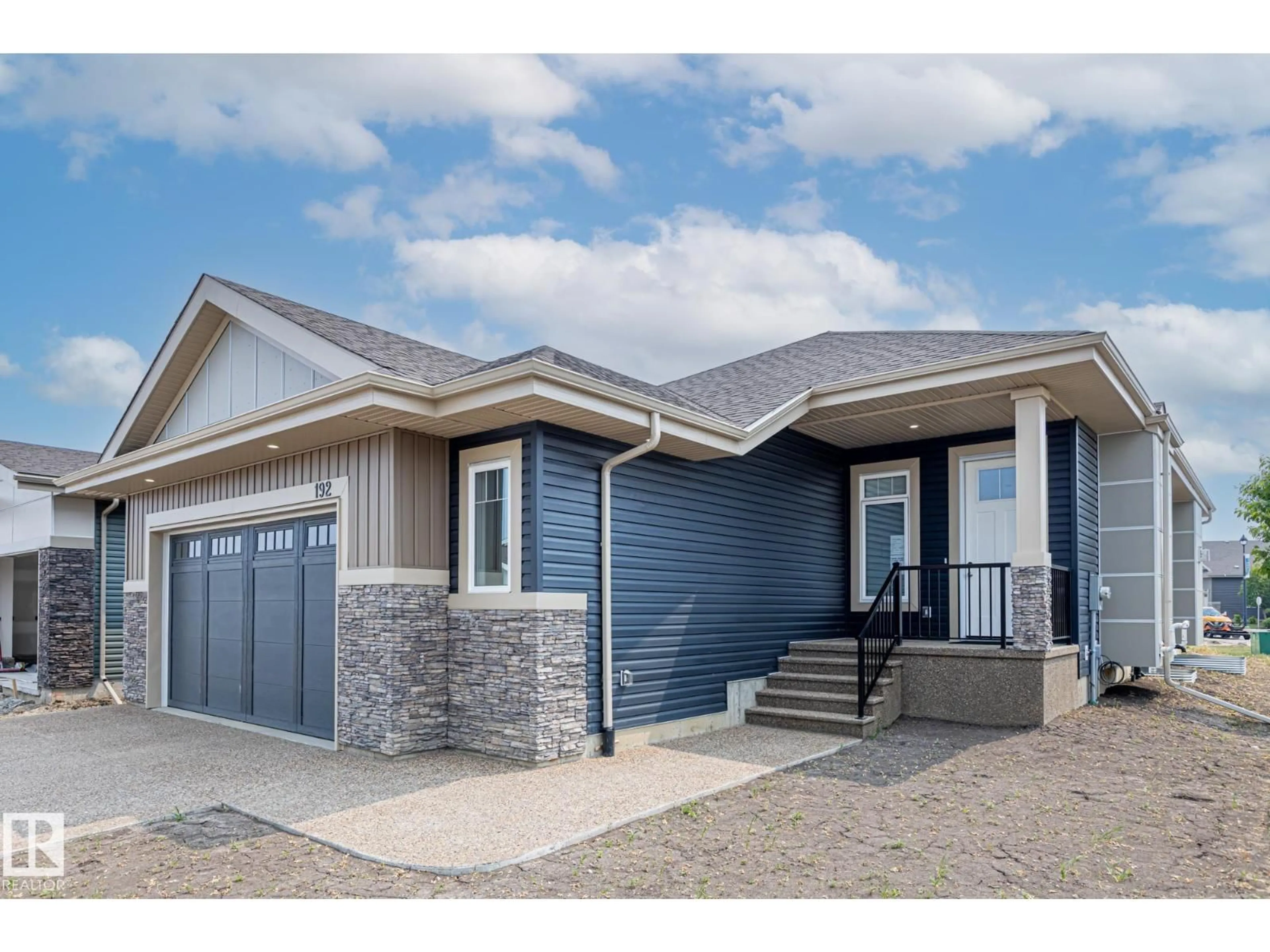 Home with vinyl exterior material, street for 50 - 192 HEATHERGLEN DR, Spruce Grove Alberta T7X4C3