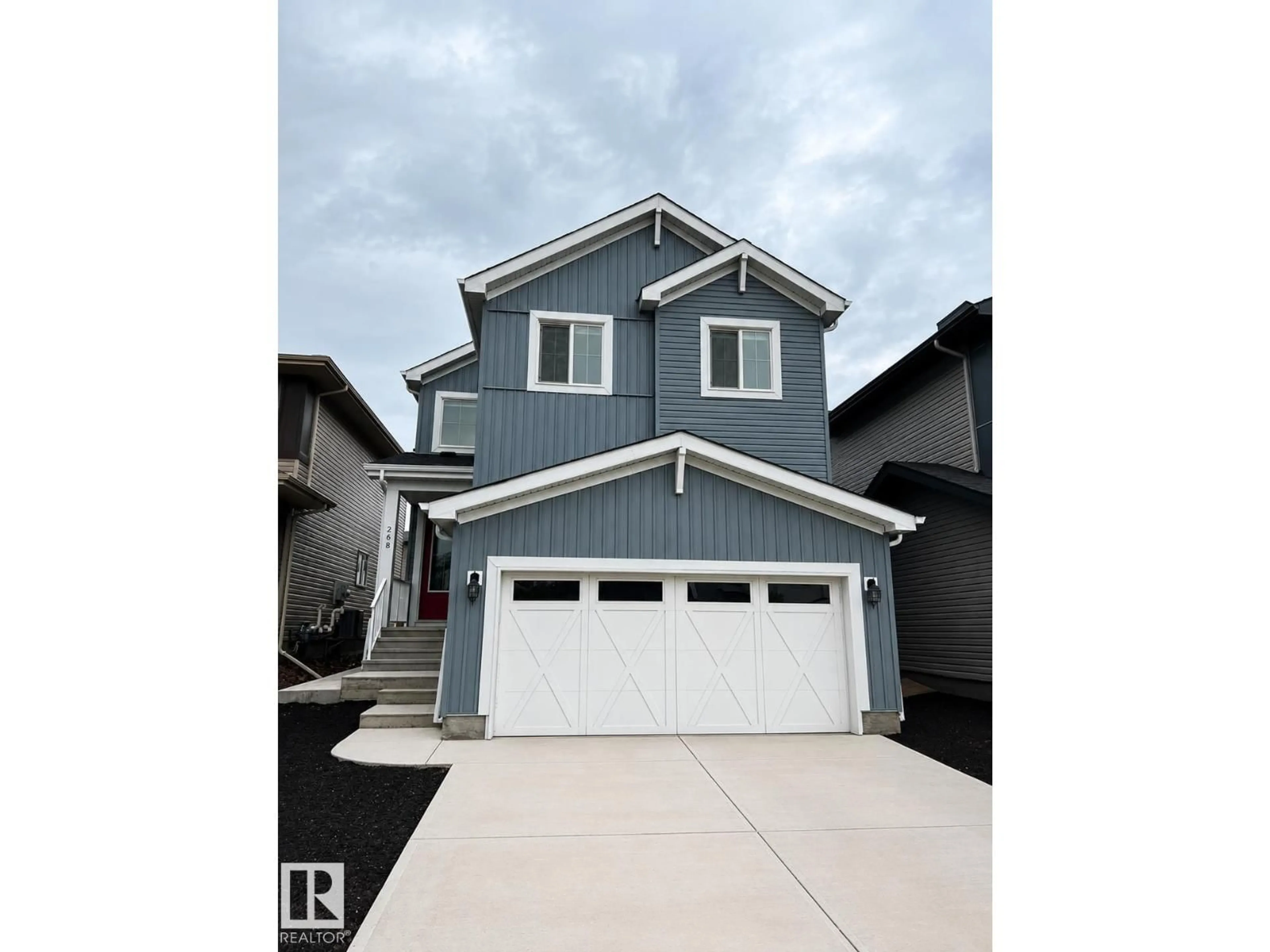 Home with vinyl exterior material, street for 268 GLENRIDDING RAVINE ROAD SW, Edmonton Alberta T6W5C3