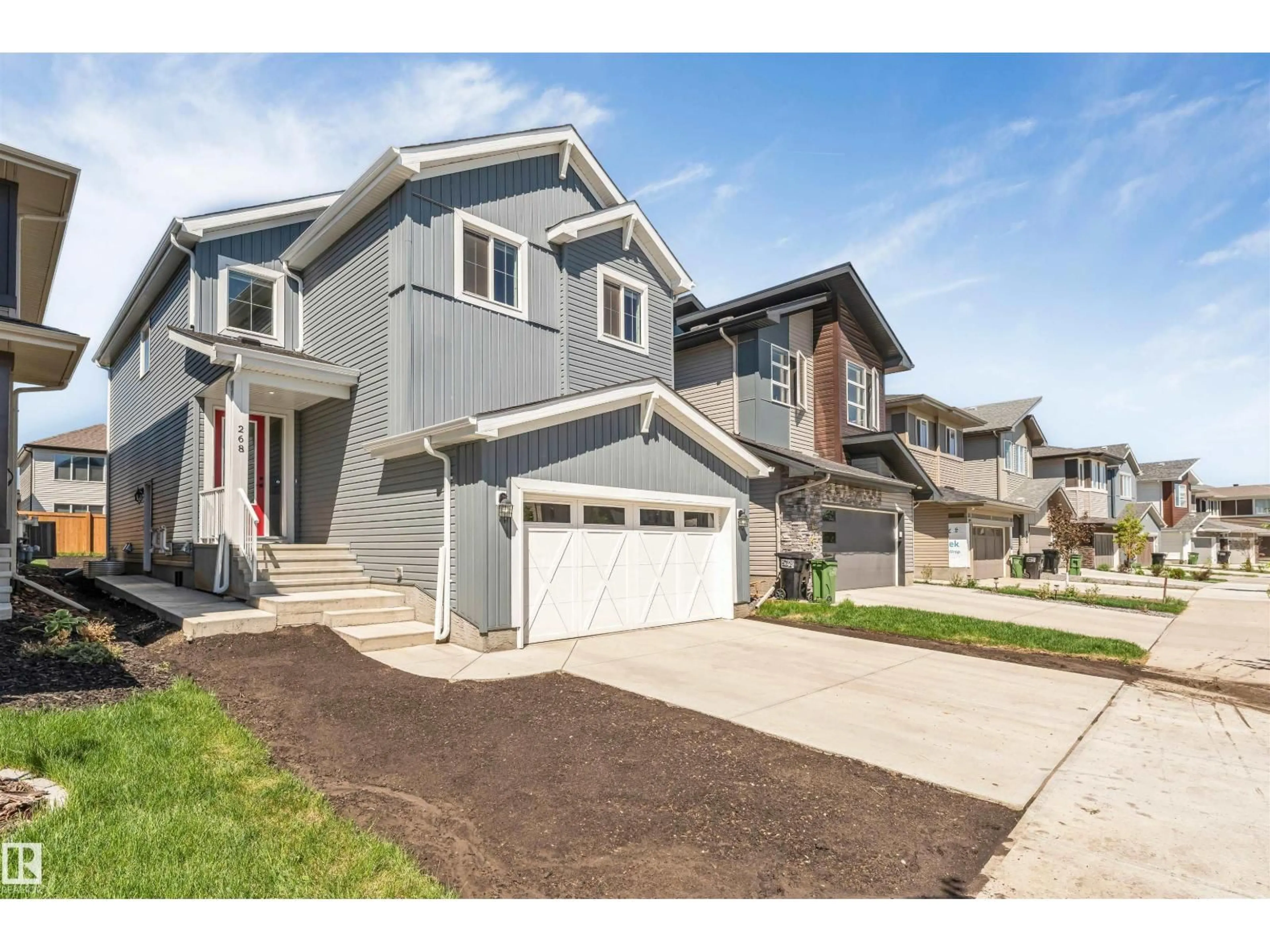 Home with vinyl exterior material, street for 268 GLENRIDDING RAVINE ROAD SW, Edmonton Alberta T6W5C3