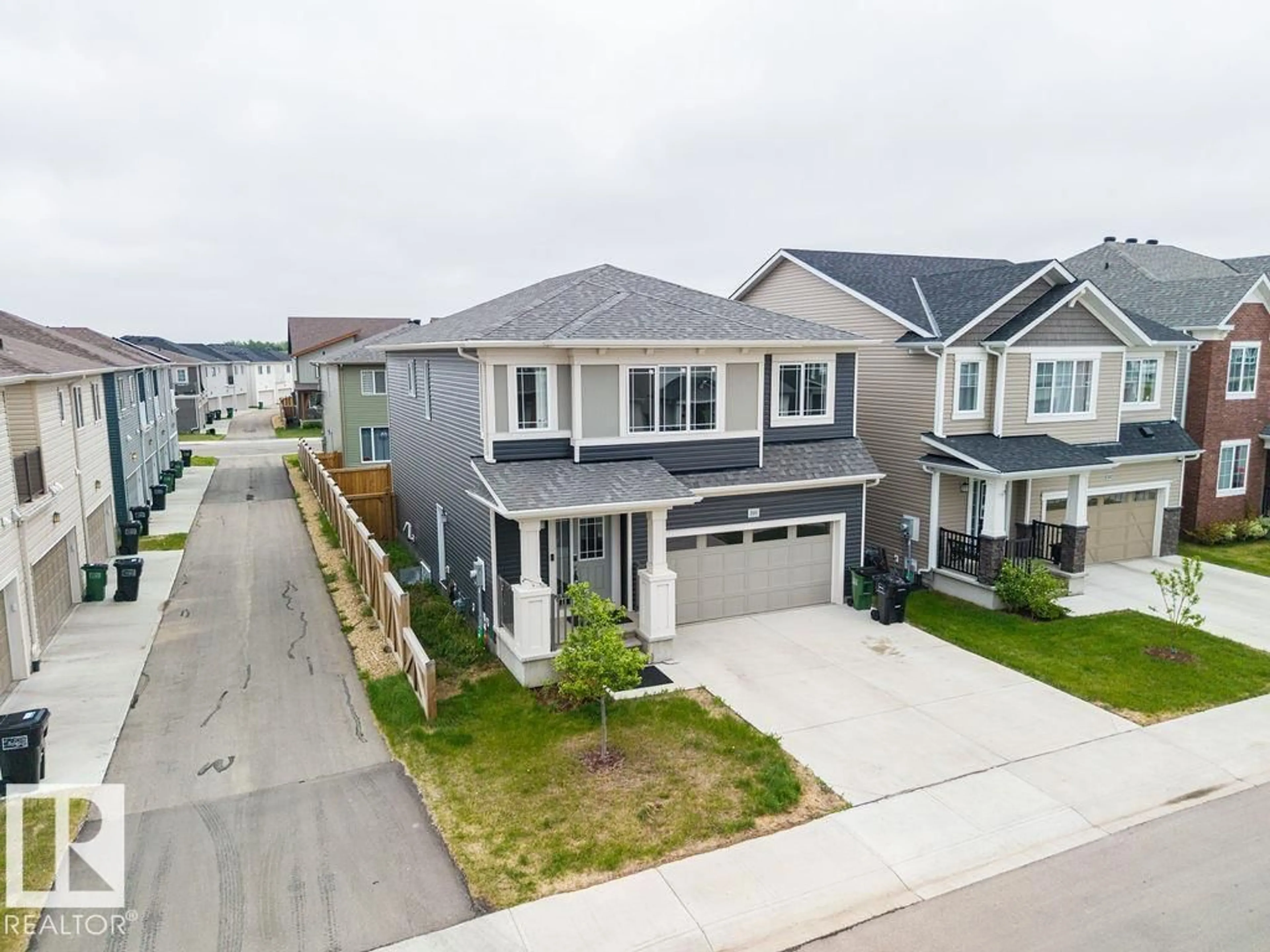 A pic from outside/outdoor area/front of a property/back of a property/a pic from drone, street for 2031 207 ST, Edmonton Alberta T6M1R7